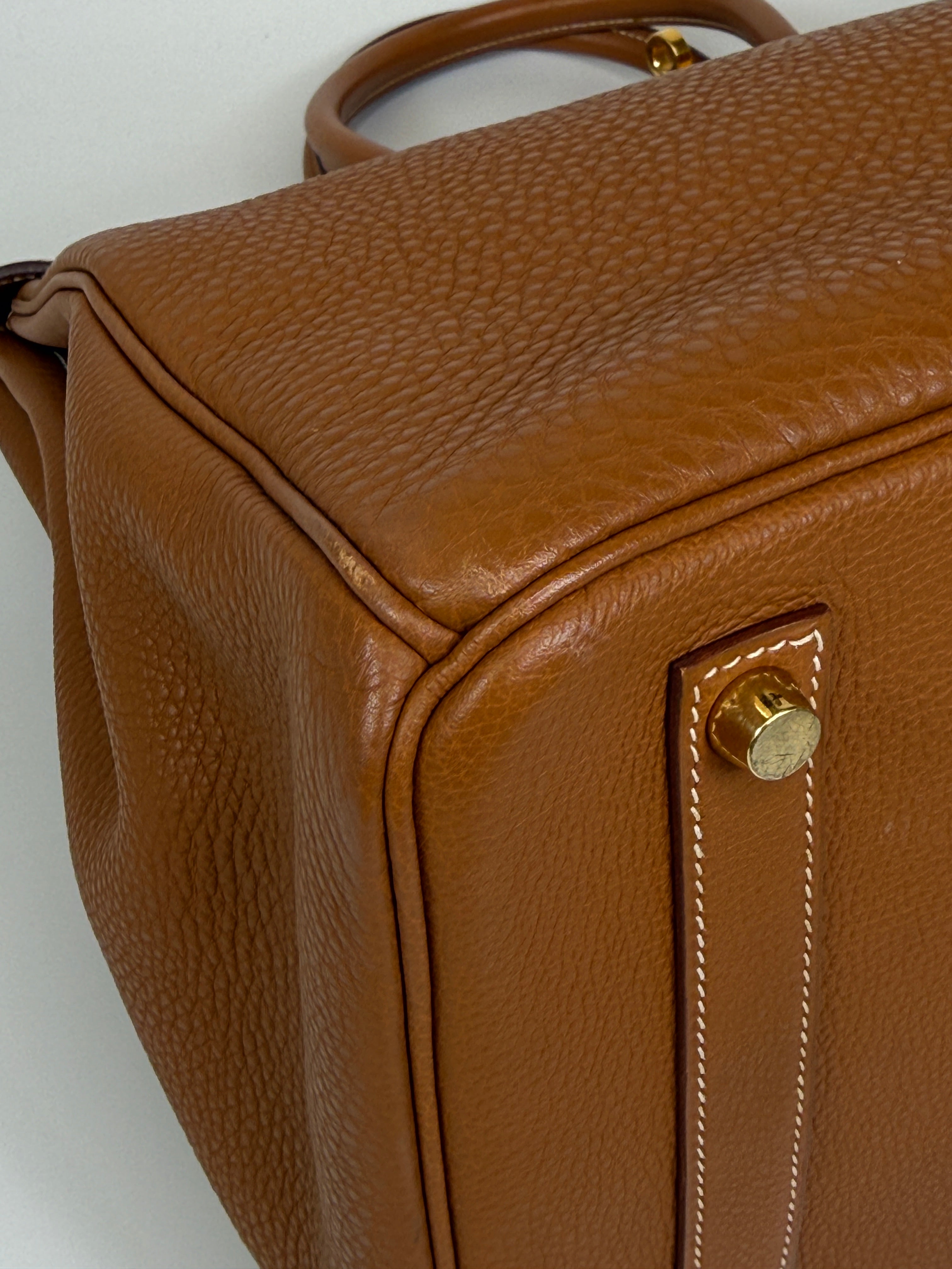 Authentic and preloved Hermès Birkin 35 In Gold Togo Leather With Gold Hardware. 100% Authenticity guarantee 