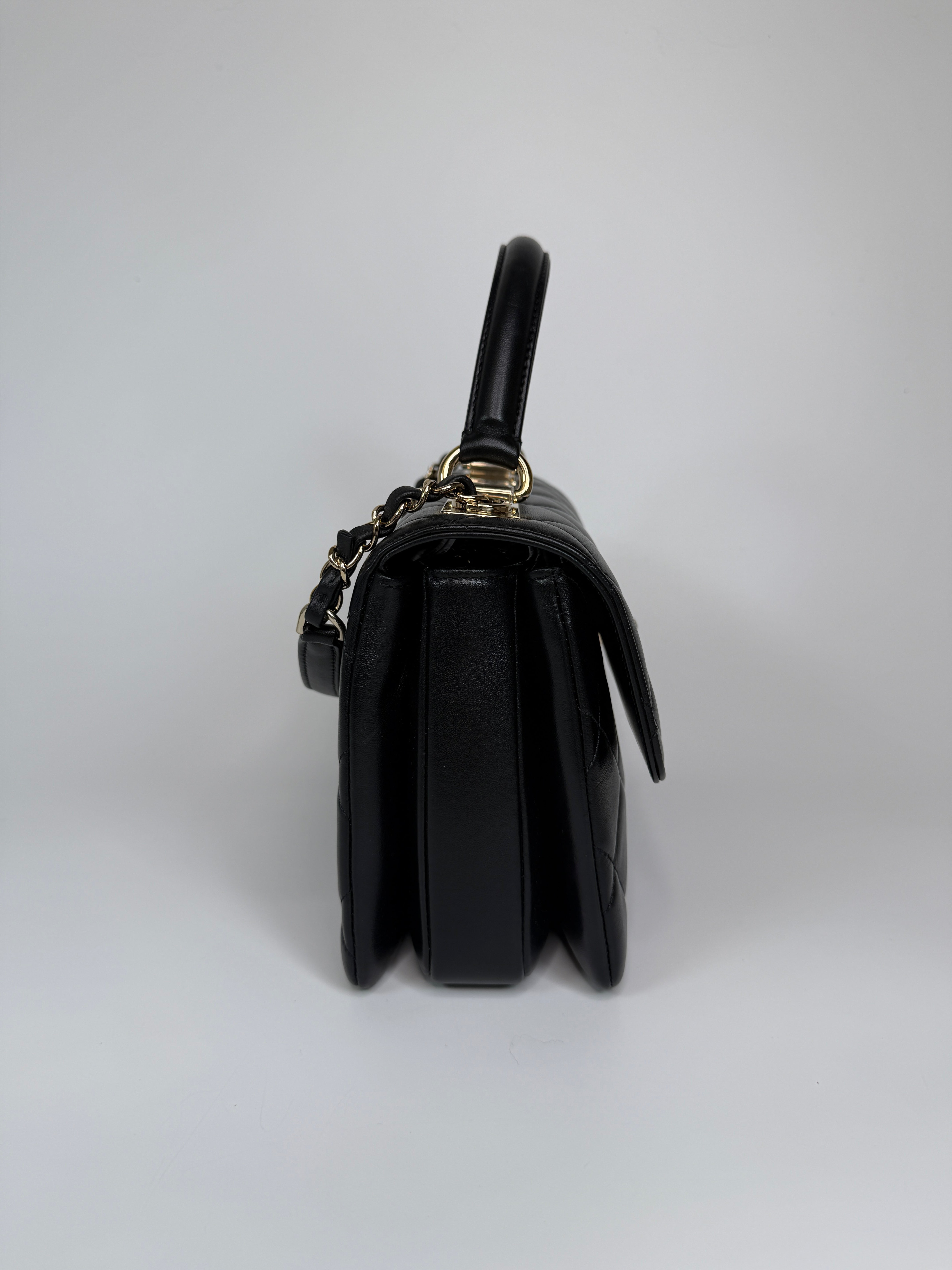 Authentic and preloved Chanel Trendy Top Handle Flap Bag In Black Lambskin With Gold Hardware. Excellent condition. 100% Authenticity guarantee 