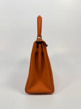 Hermès Kelly 25 In Orange Togo Leather With PHW