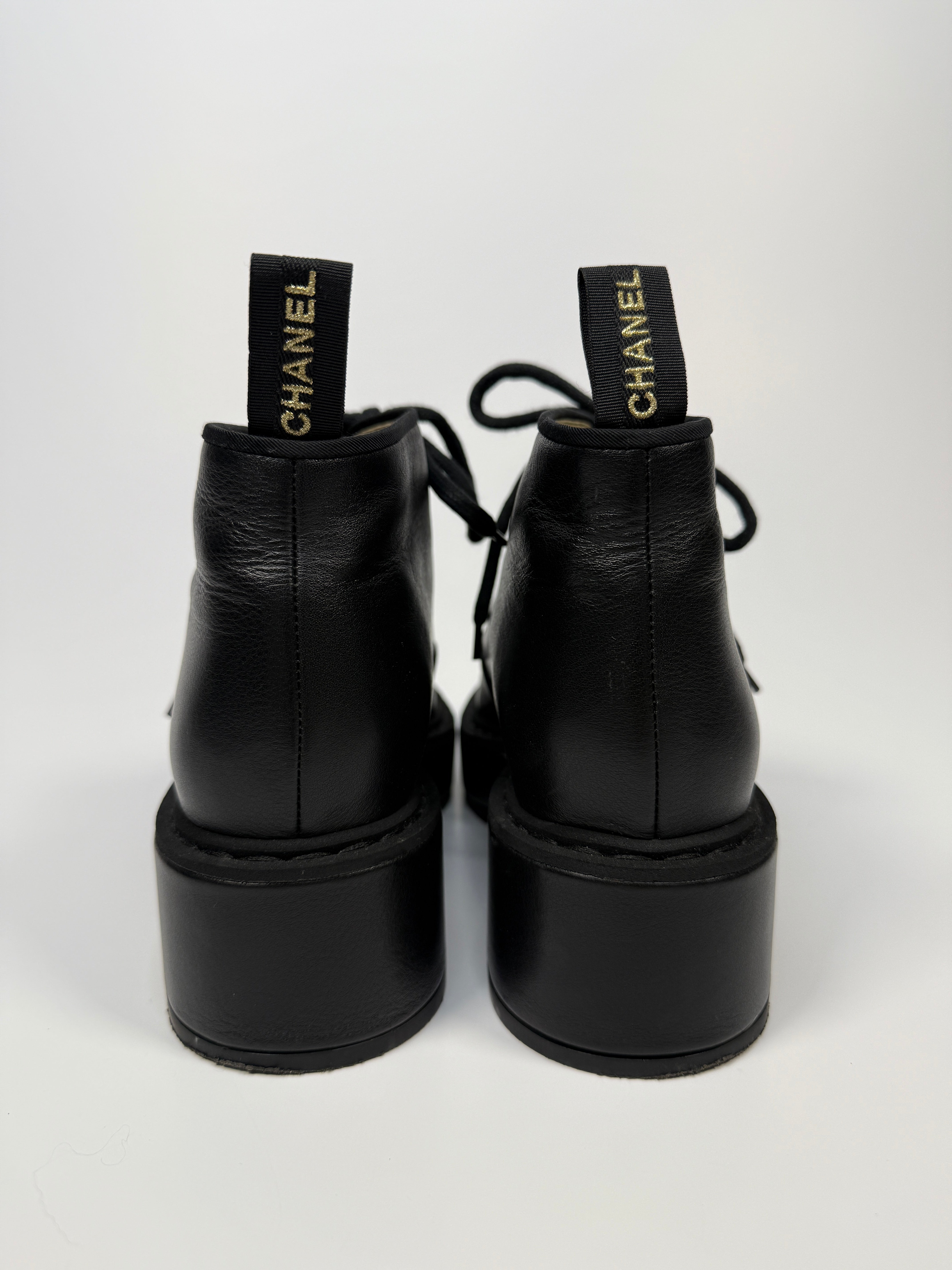 Chanel CC Toe Cap and pearl eyelet Anklet boots In Black Leather. UK6.5 Excellent. Authentic and preloved. 