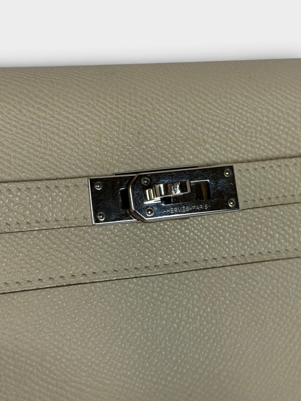 Hermès Kelly To Go In Craie Epsom Leather With Palladium Hardware. Authentic and preloved in excellent condition. 100% guarantee