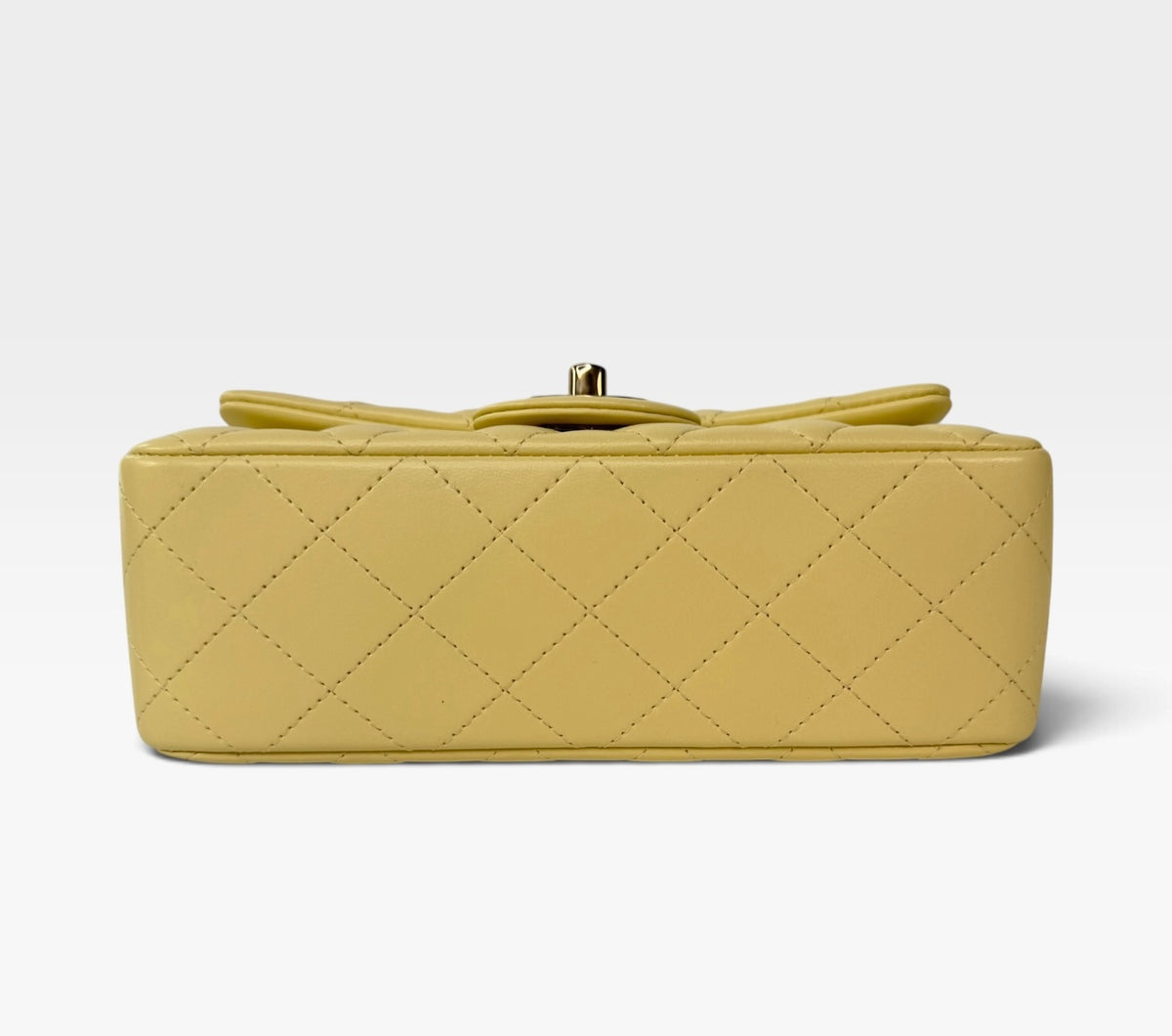 Chanel Mini Rectangle In Yellow Lambskin Leather With Gold Hardware. 100% authentic and preloved in excellent condition