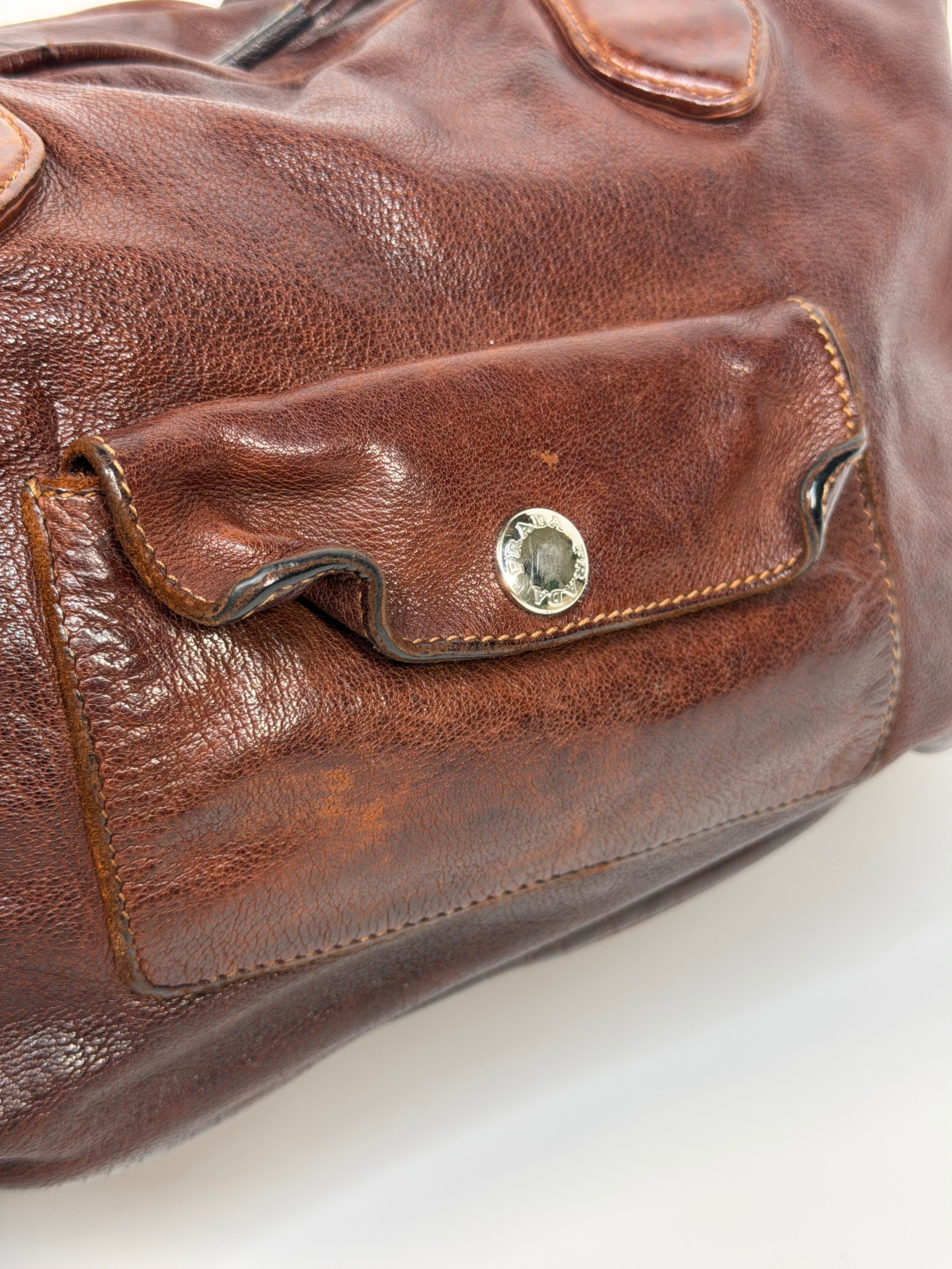Prada Washed Bauletto Shoulder Bag In Brown Leather With Gold Hardware. Authentic and preloved in very good condition