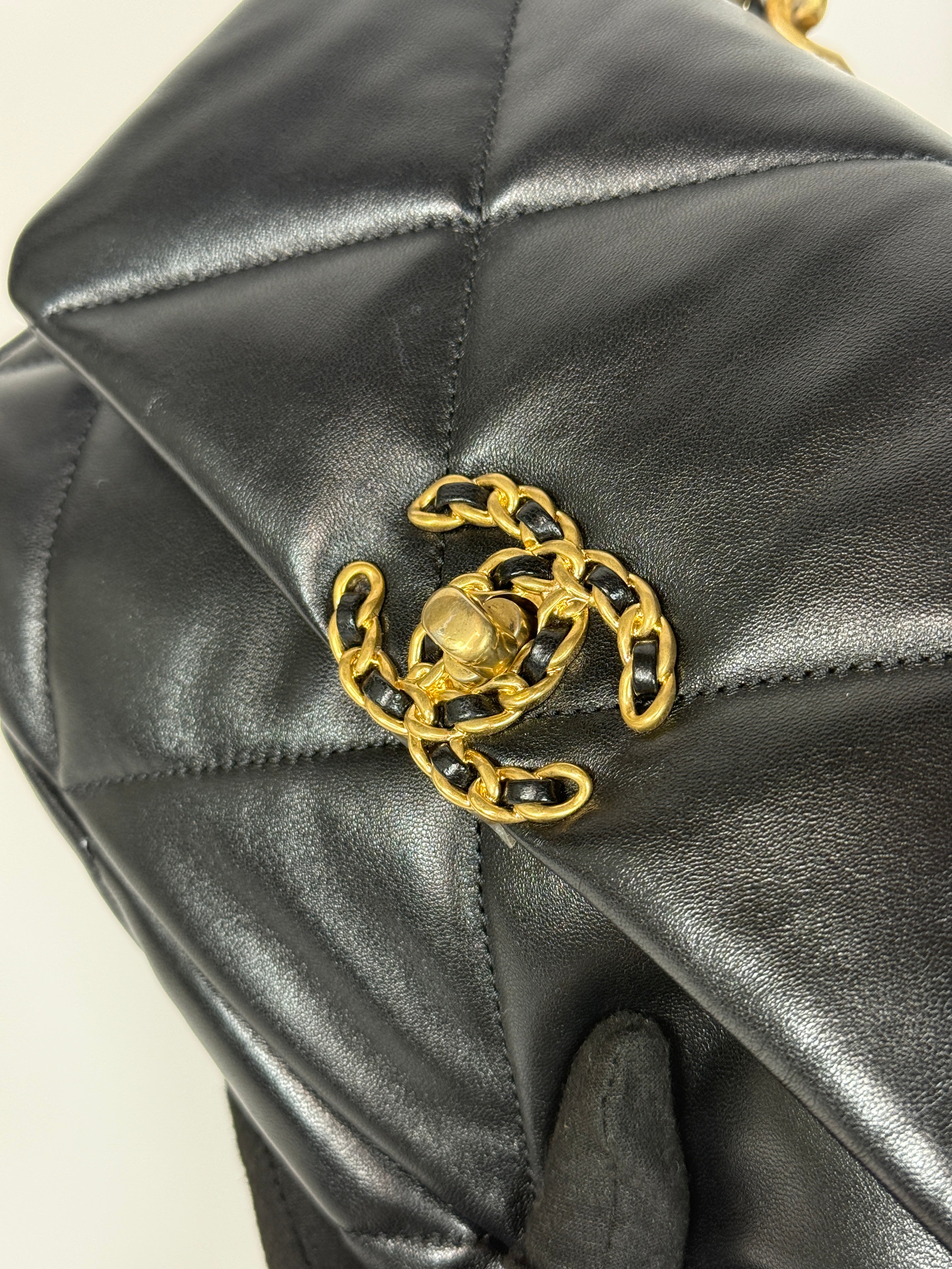 Authentic and preloved Chanel 19 Small In Black Lambskin Leather Mixed hardware. Excellent condition. 100% Authenticity guarantee 