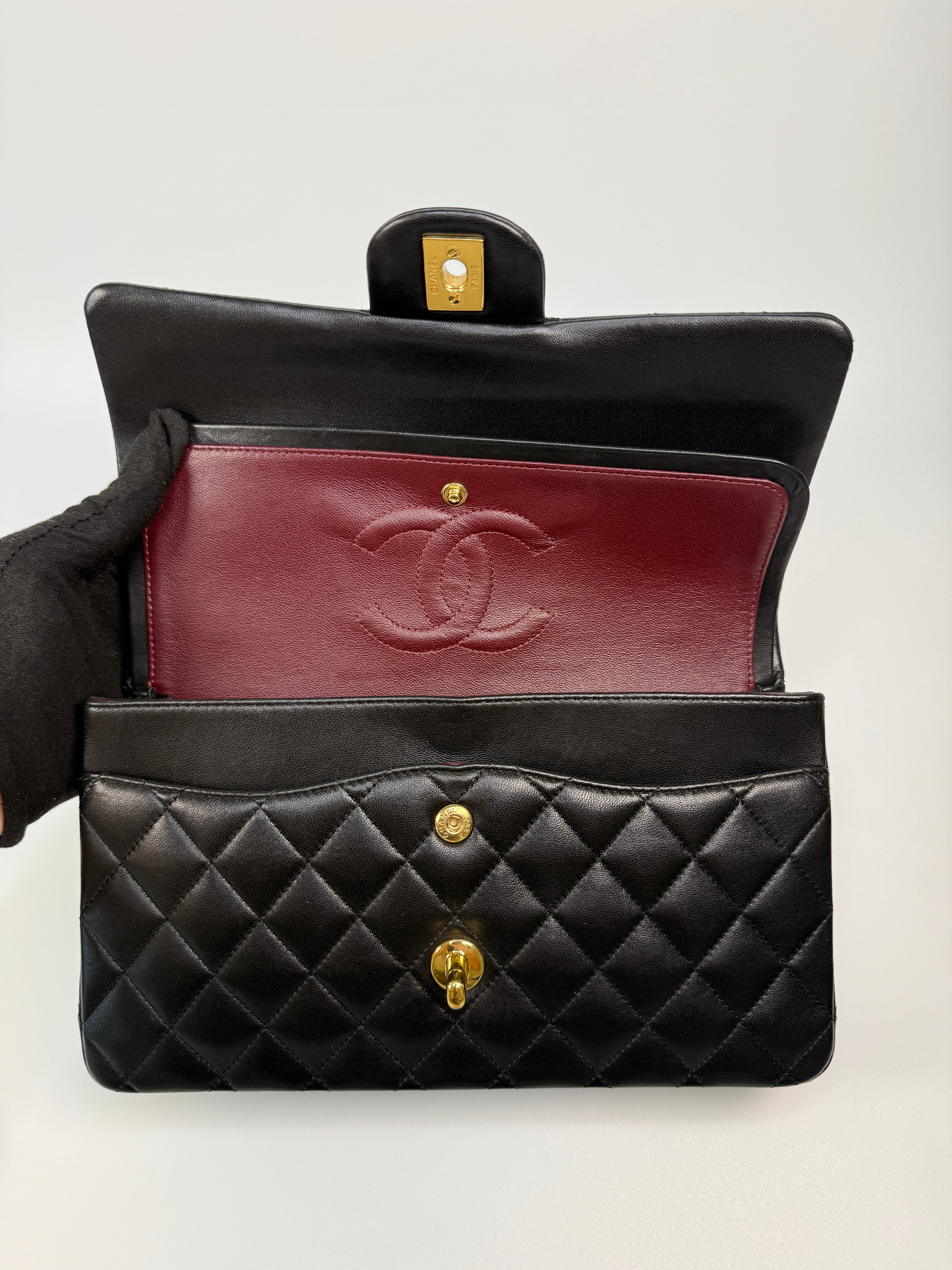 Chanel Medium Classic Double Flap Black Lambskin With Gold Hardware
Authentic Pre Loved Verified by Luxe Cheshire Trusted Designer resale