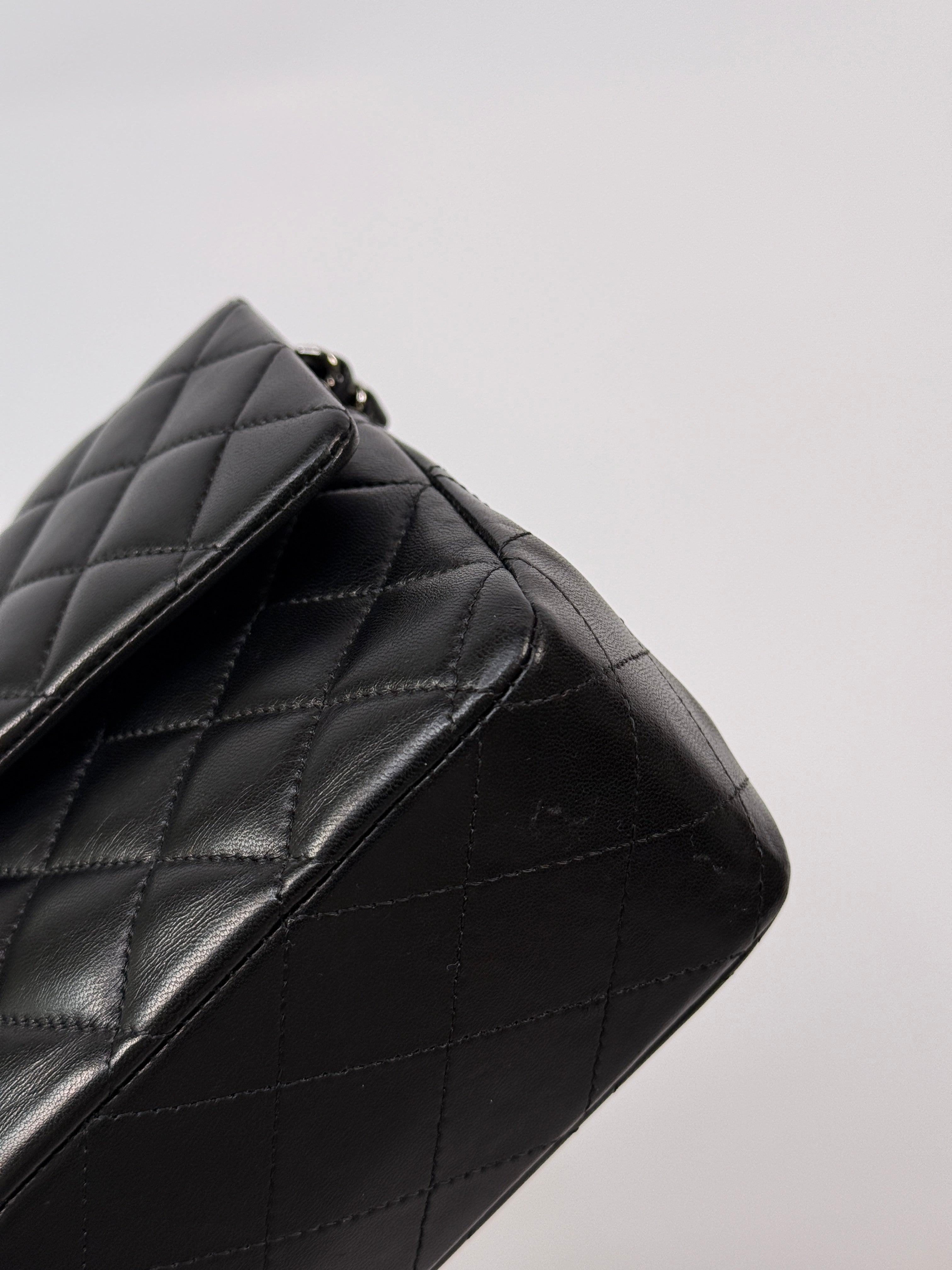 Chanel Medium Classic Double Flap Black Lambskin Leather With Silver Hardware
Pre Loved & Authentic