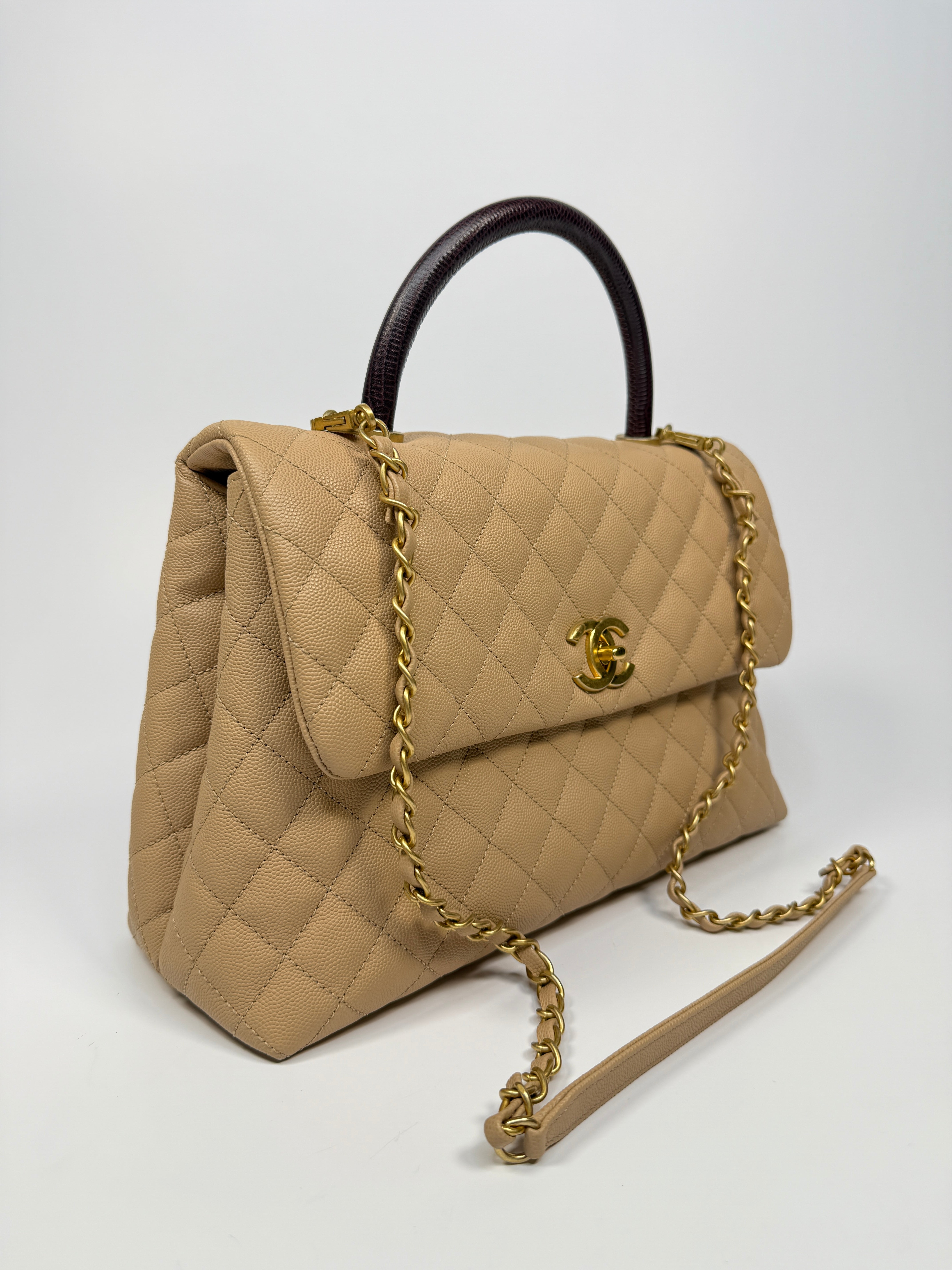 Chanel Coco Large Top Handle In Beige Caviar Leathe With Gold Hardware
Pre Loved & Authentic 