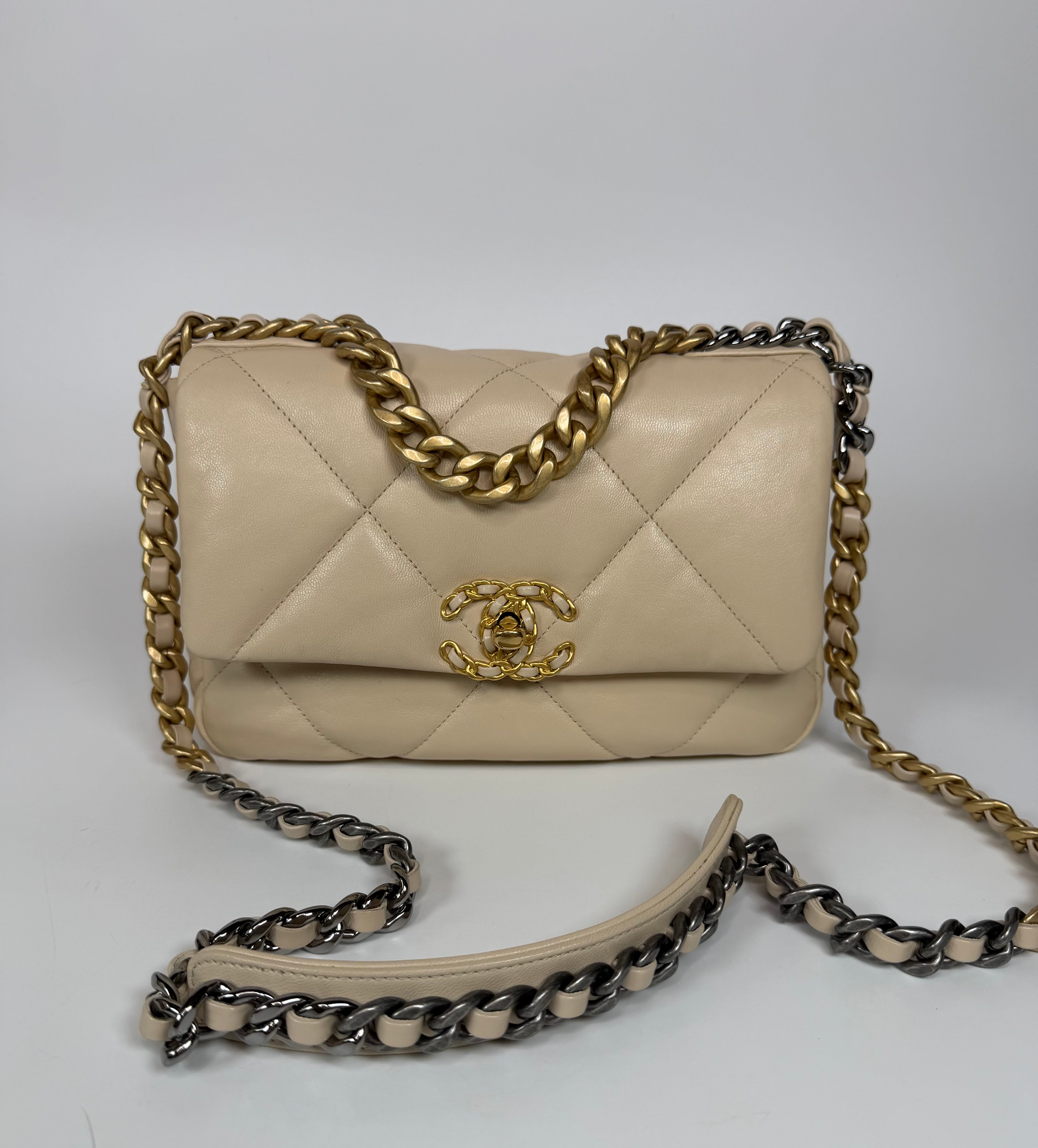 Chanel 19 Small In Beige Leather With Mixed Hardware. Authentic and preloved in excellent condition. Verified by Luxe Cheshire.