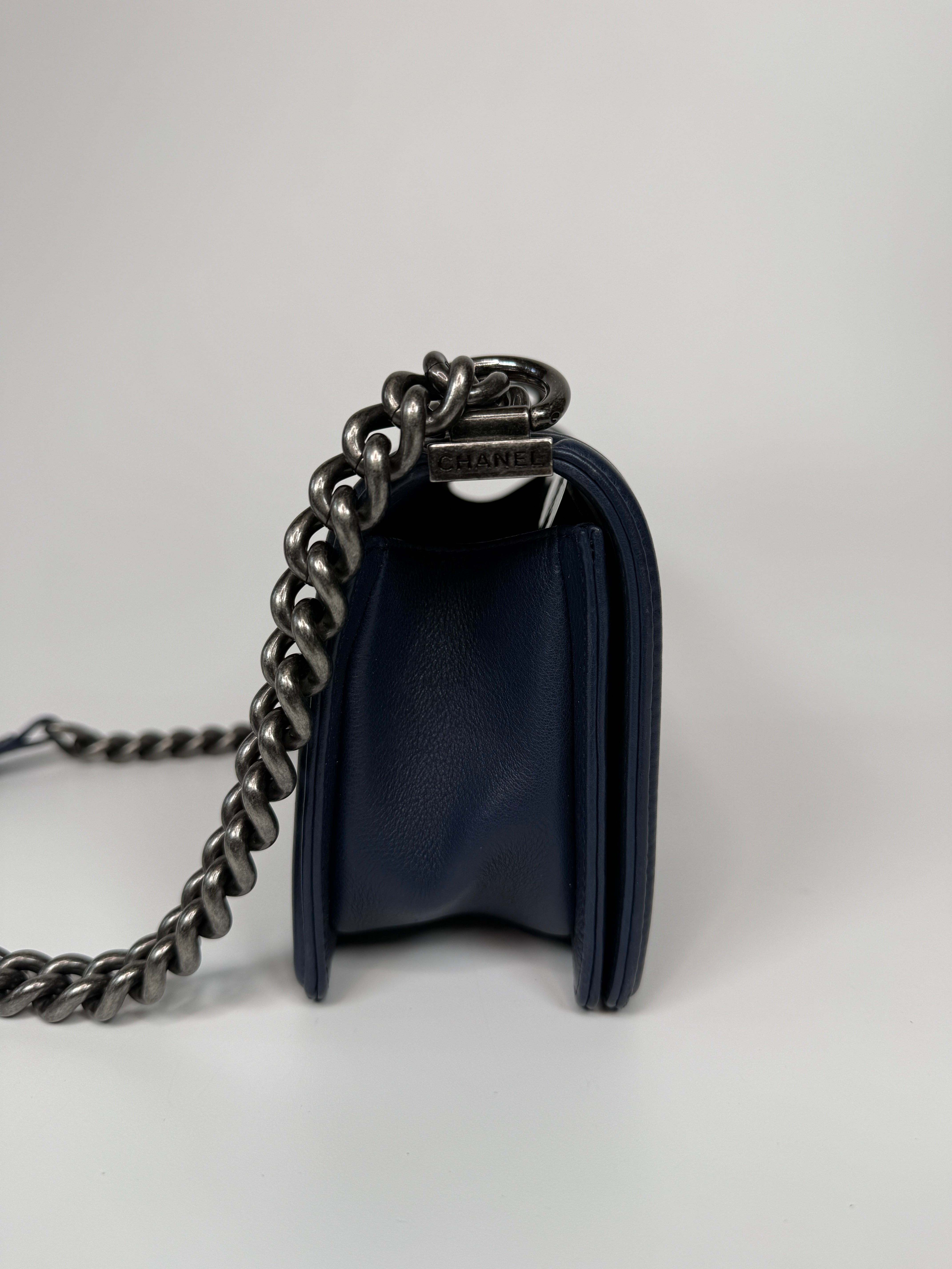 Chanel Mini Boy Bag In Navy Lambskin With Ruthenium Hardware In Excellent Condition.
Authentic Pre Loved Verified by Luxe Cheshire Trusted Designer resale 