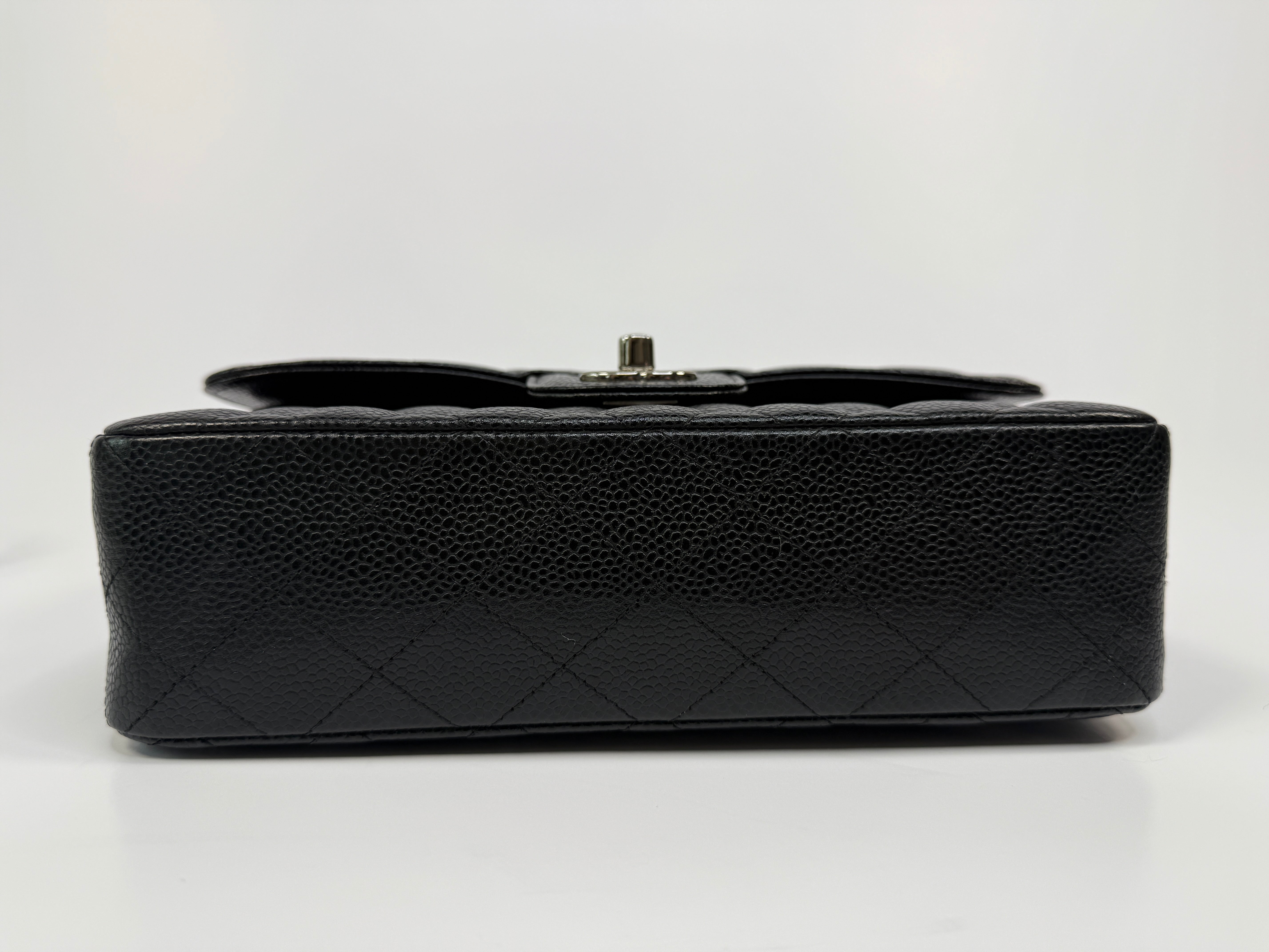 Chanel Small Classic Double Flap In Black Caviar Leather With Silver Hardware
Pre Loved & Authentic 