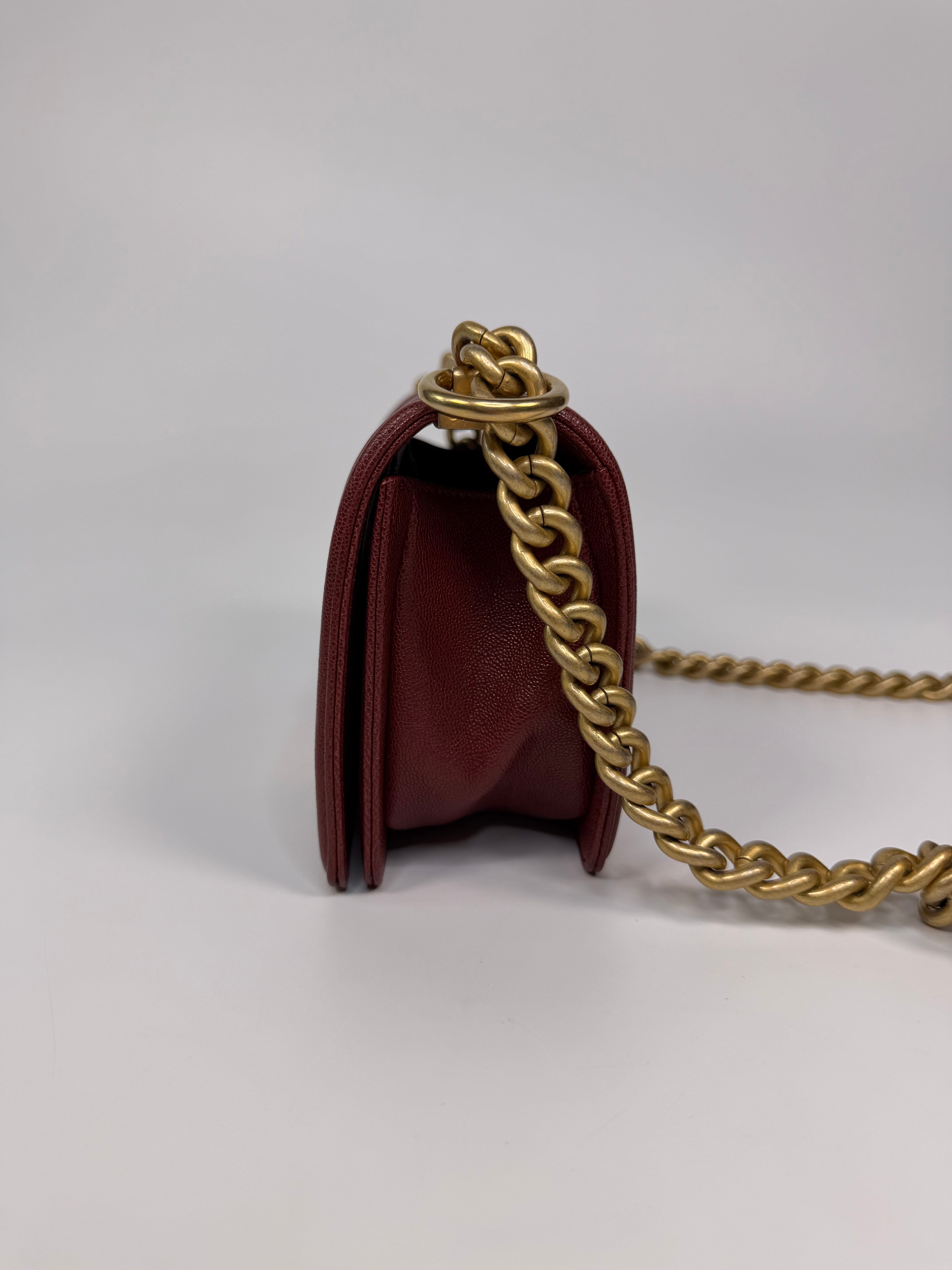 Chanel Le Boy Bag In Burgundy Caviar Leather Gold Hardware. Authentic and preloved in excellent condition.
