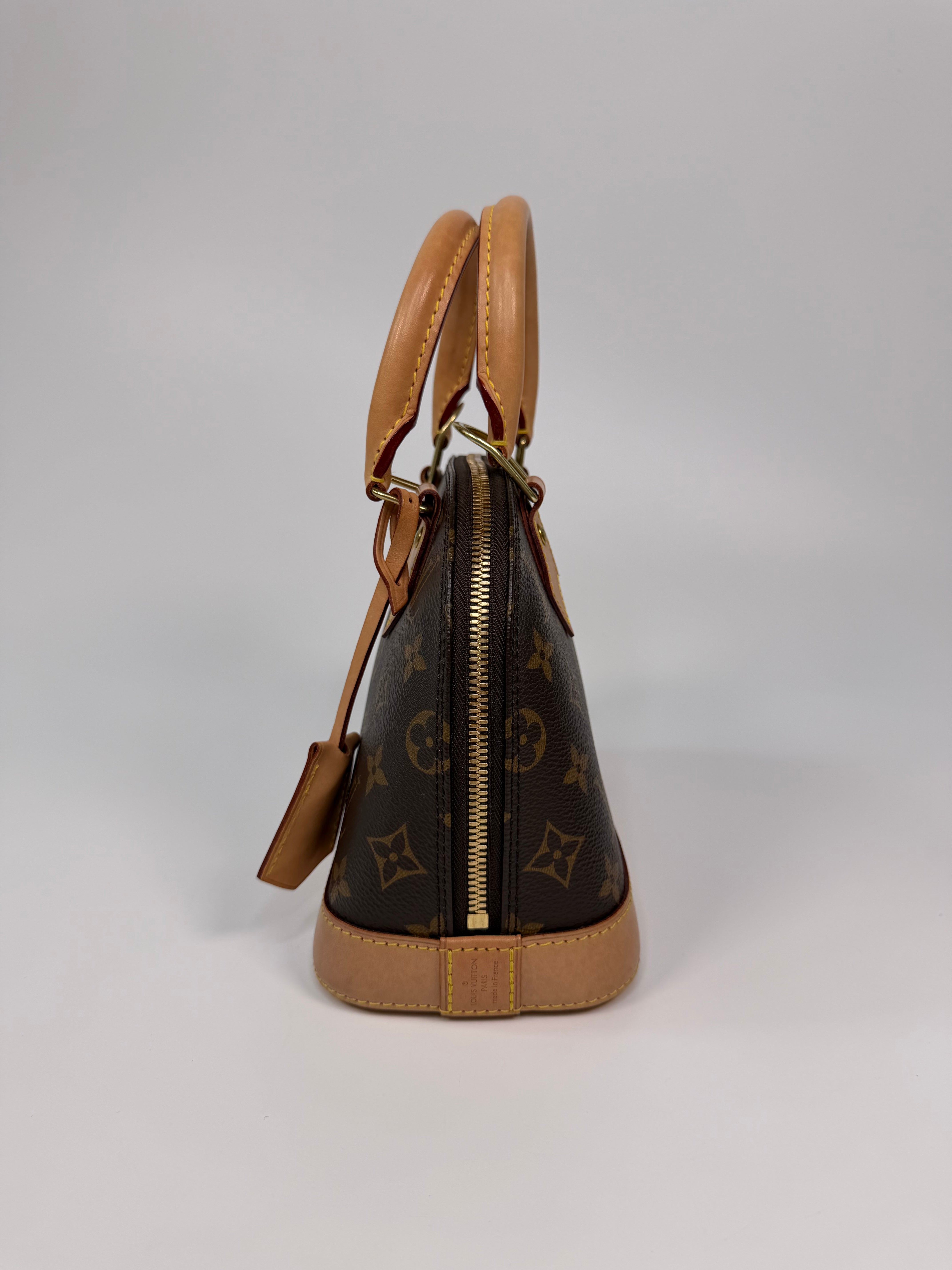 Louis Vuitton Alma BB In Brown Monogram Canvas With Gold Hardware. Authentic and preloved in very good condition