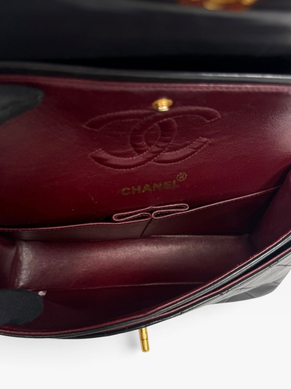 Chanel Vintage Small Classic Double Flap In Black Lambskin Leather 24Kt Hardware. Authentic and preloved in excellent condition. 100% guarantee