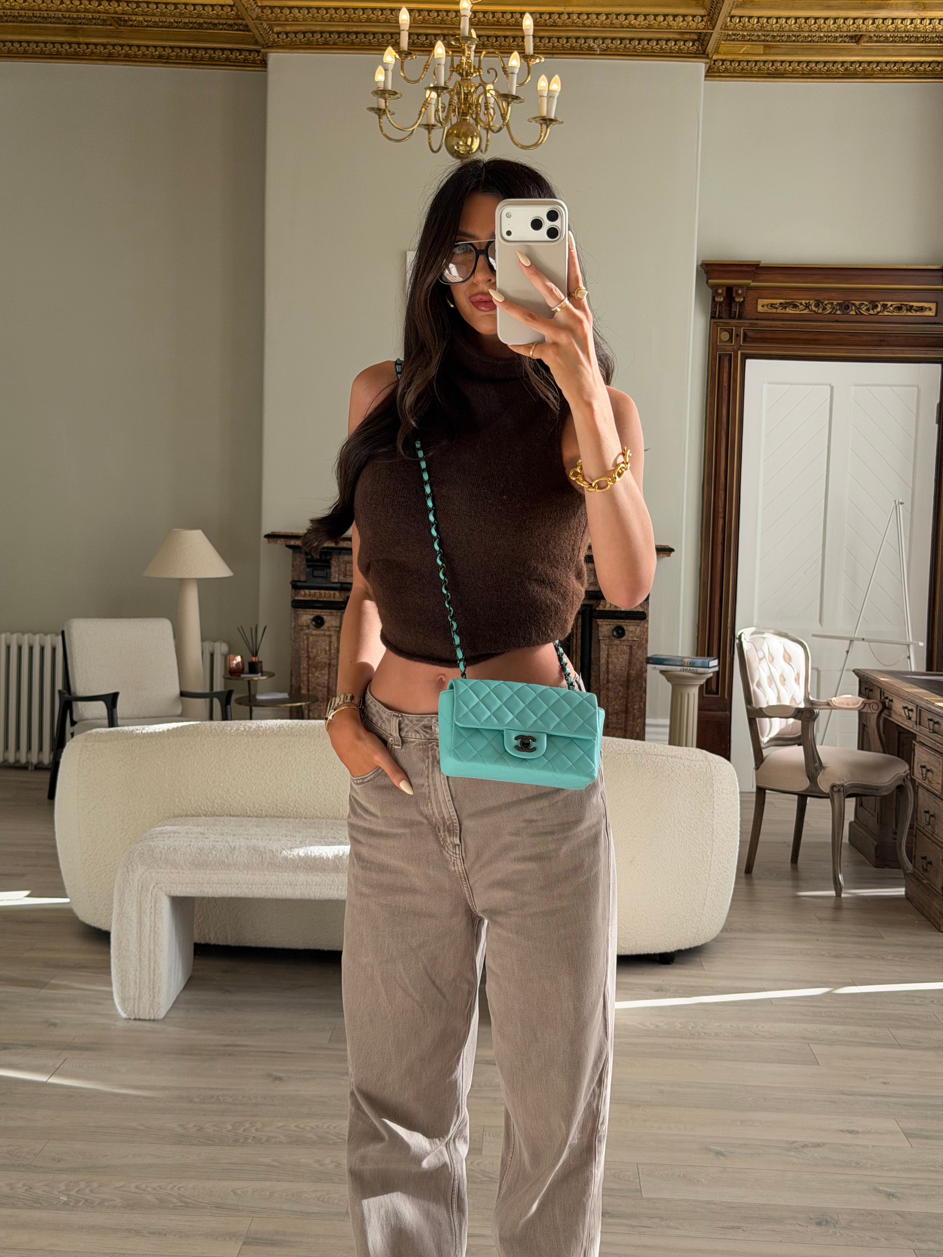 Authentic and preloved Chanel Mini Rectangle Flap Bag In Turquoise Lambskin Leather With Gunmetal Hardware In Excellent condition. Verified by Luxe Cheshire. 100% Authenticity Guarantee. 