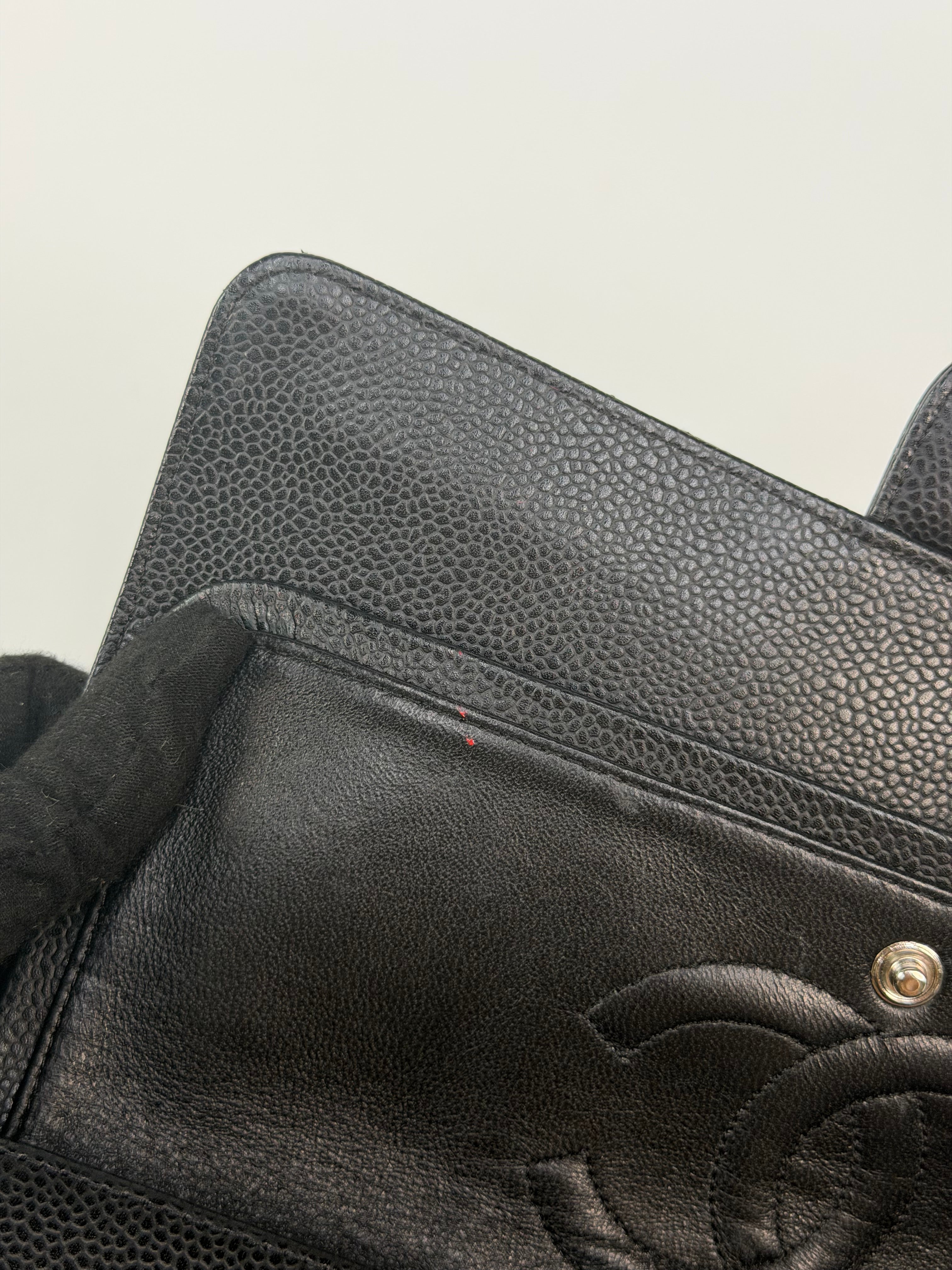 Chanel Vintage Medium Classic Double Flap Black Caviar Silver Hardware. 100% authentic and preloved in excellent condition