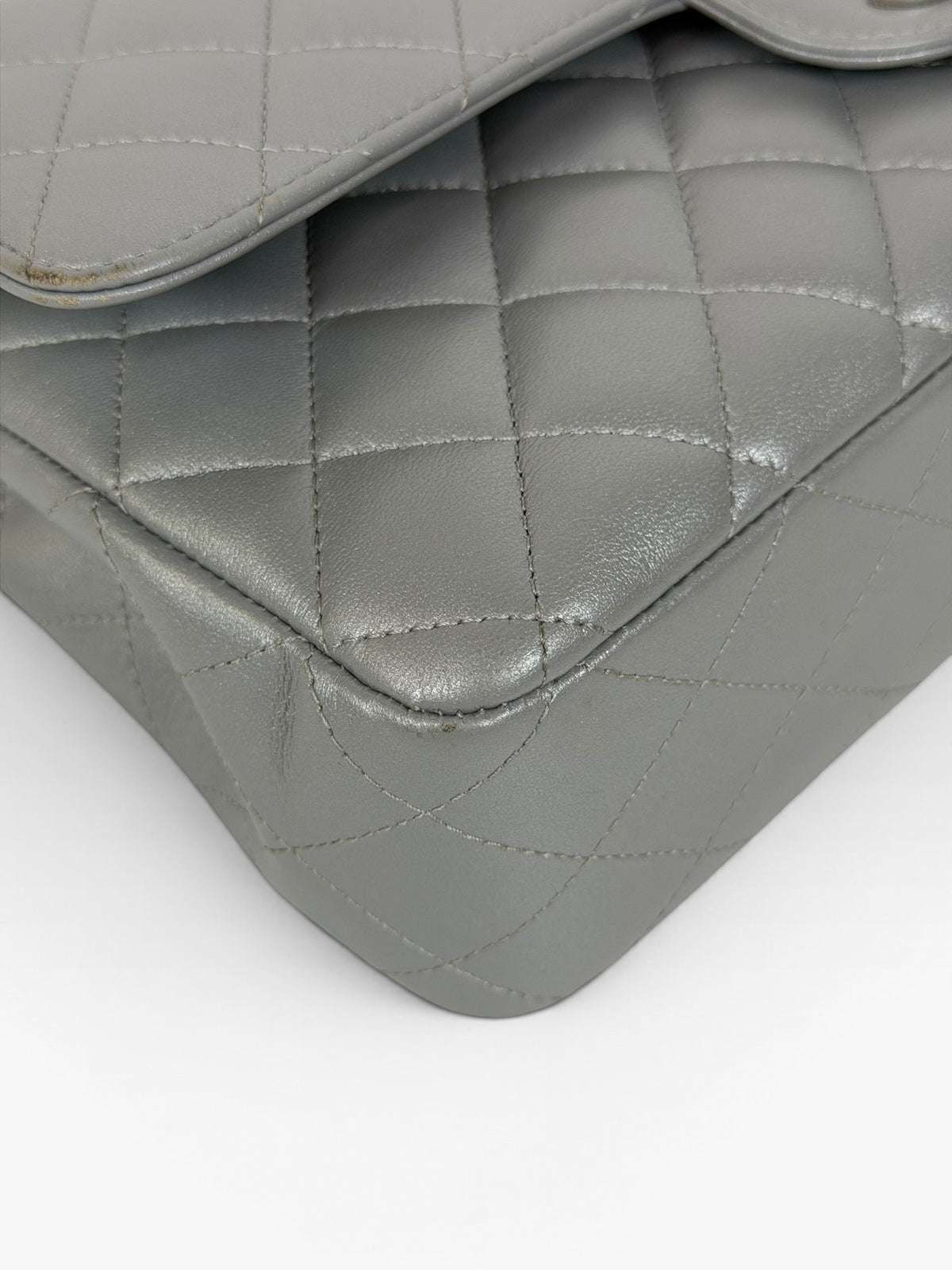 Chanel Medium Classic Double Flap In Silver Lambskin Leather Silver Hardware. 100% authentic and preloved in excellent condition