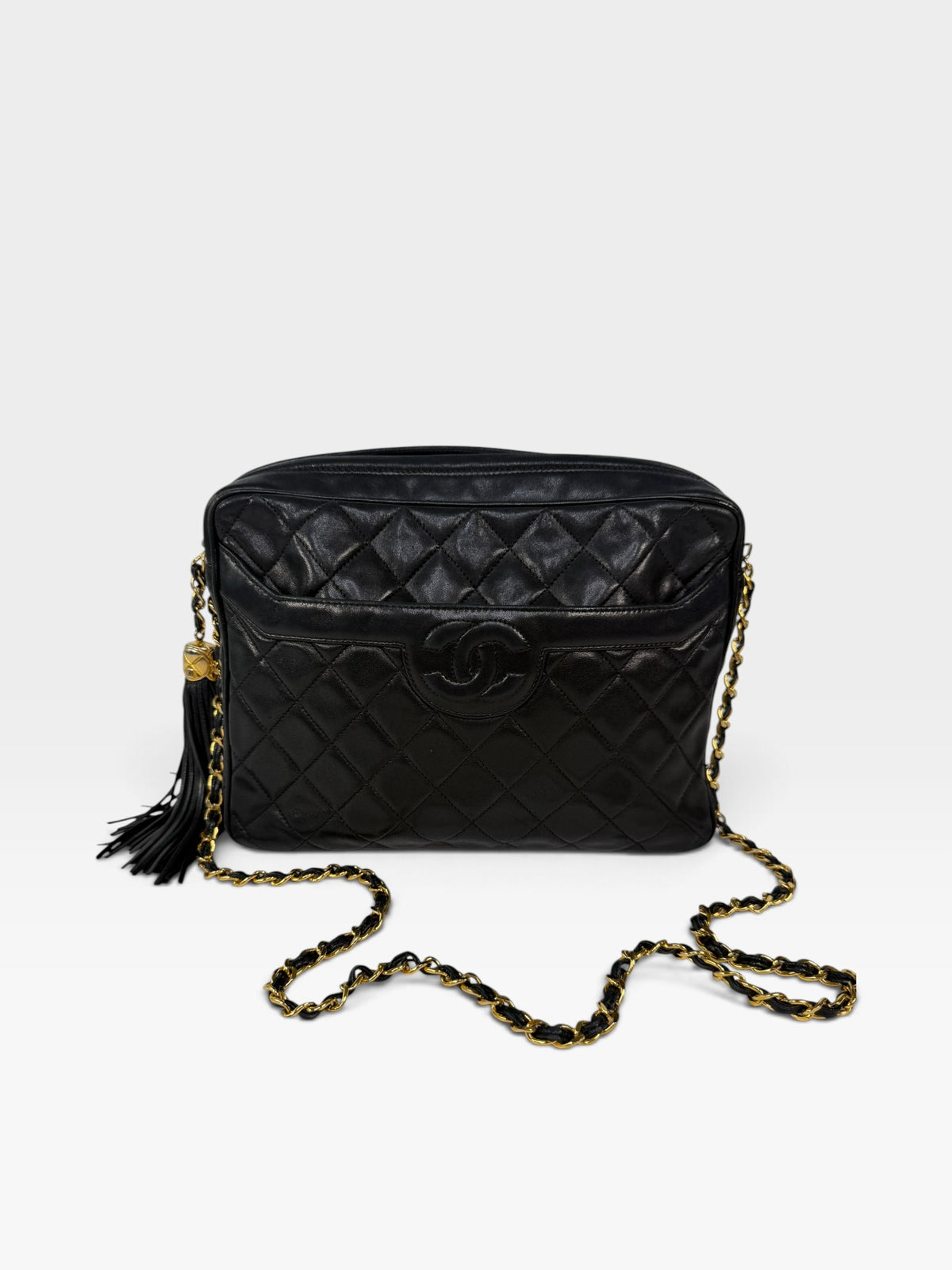 Chanel Vintage Quilted Camera Bag In Black Lambskin With 24kt Gold Hardware 100% authentic and preloved in excellent condition