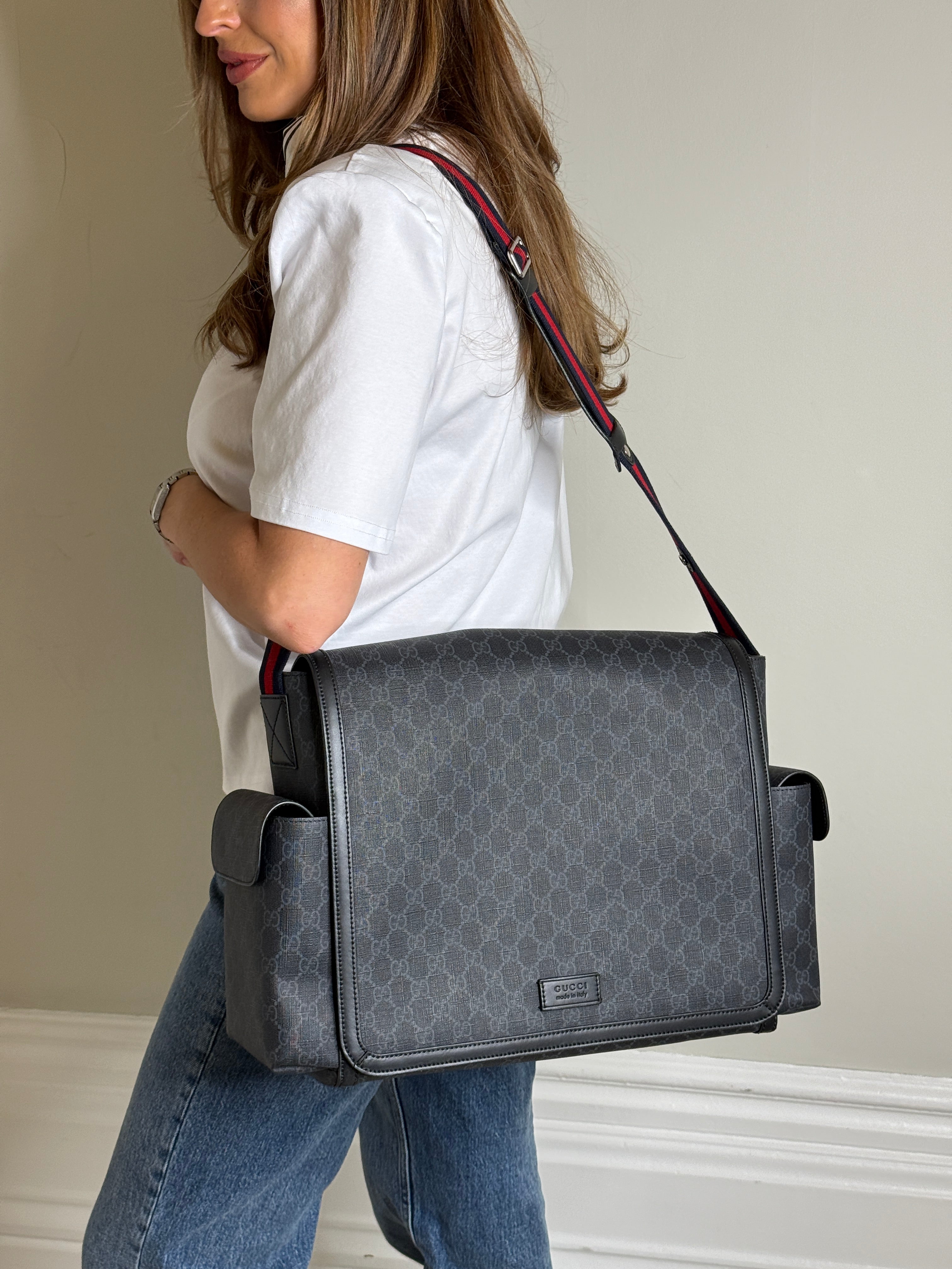 Authentic and preloved Gucci GG Supreme Medium Baby Changing Bag In Black Canvas. Excellent condition. 100% Authenticity guarantee 