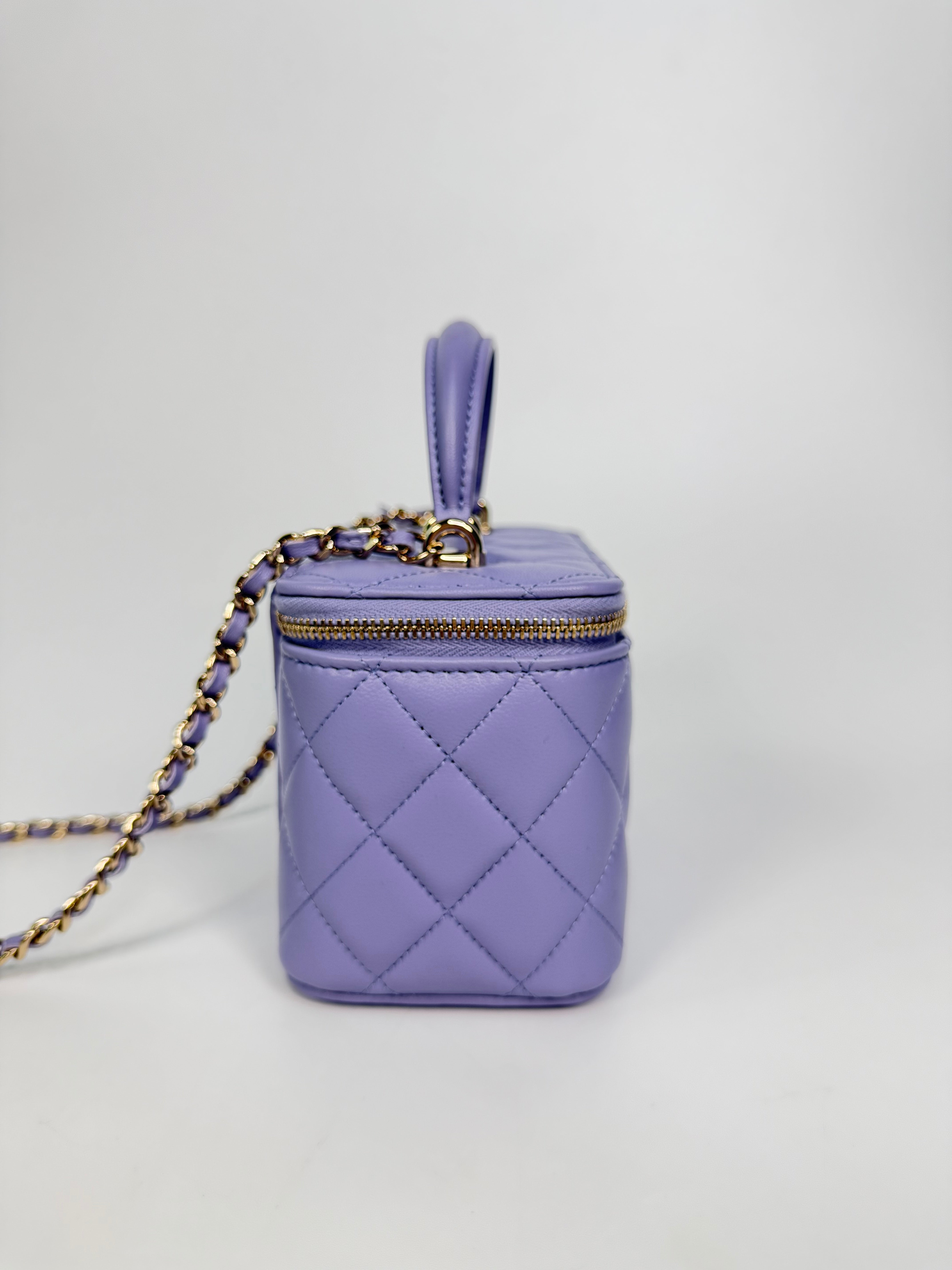 Chanel Mini Vanity Top Handle In Lilac Lambskin Leather With Gold Hardware. Authentic and preloved in excellent condition