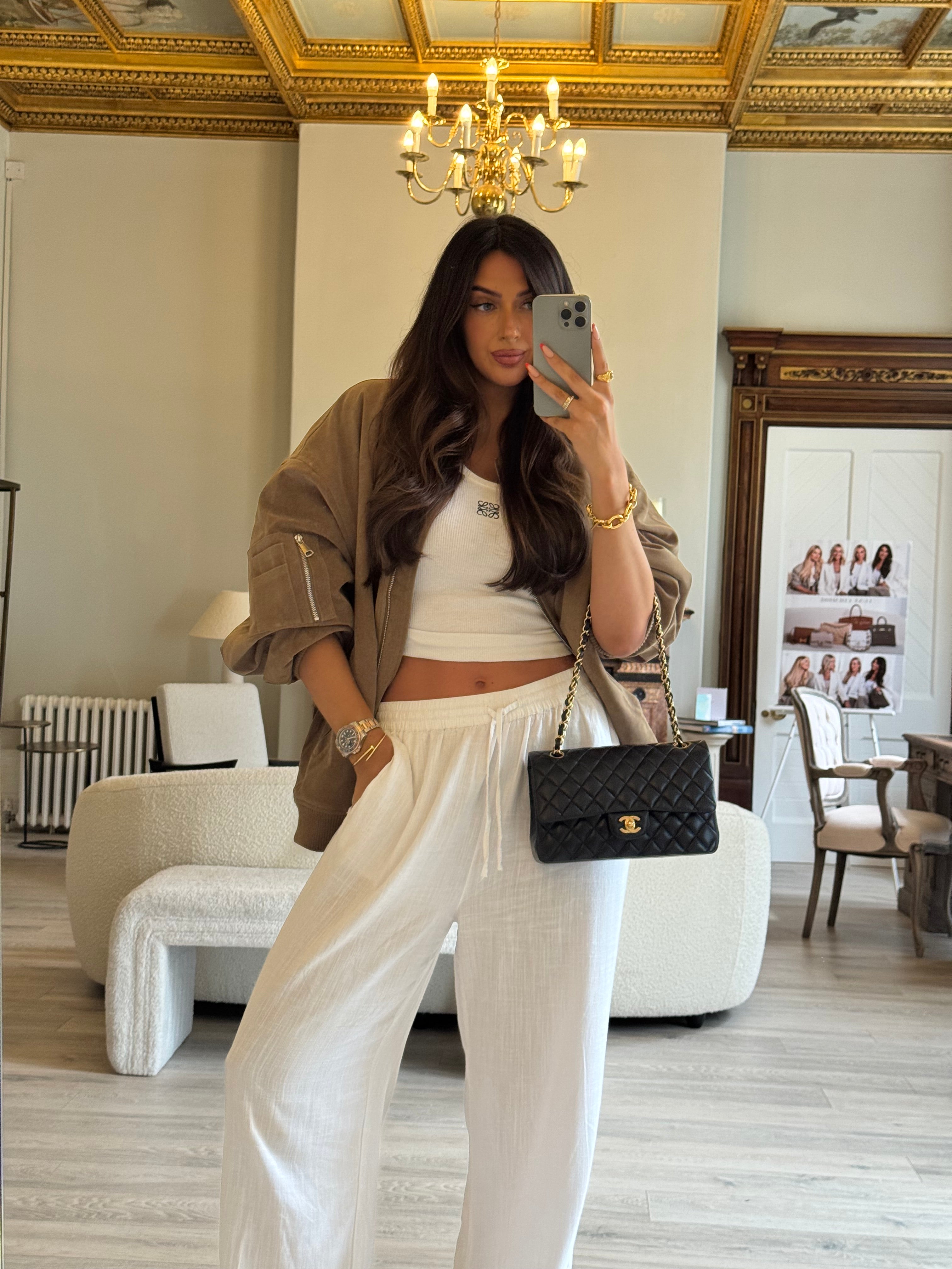 Chanel Medium Classic Double Flap Black Lambskin With Gold Hardware
Pre Loved & Authentic 
