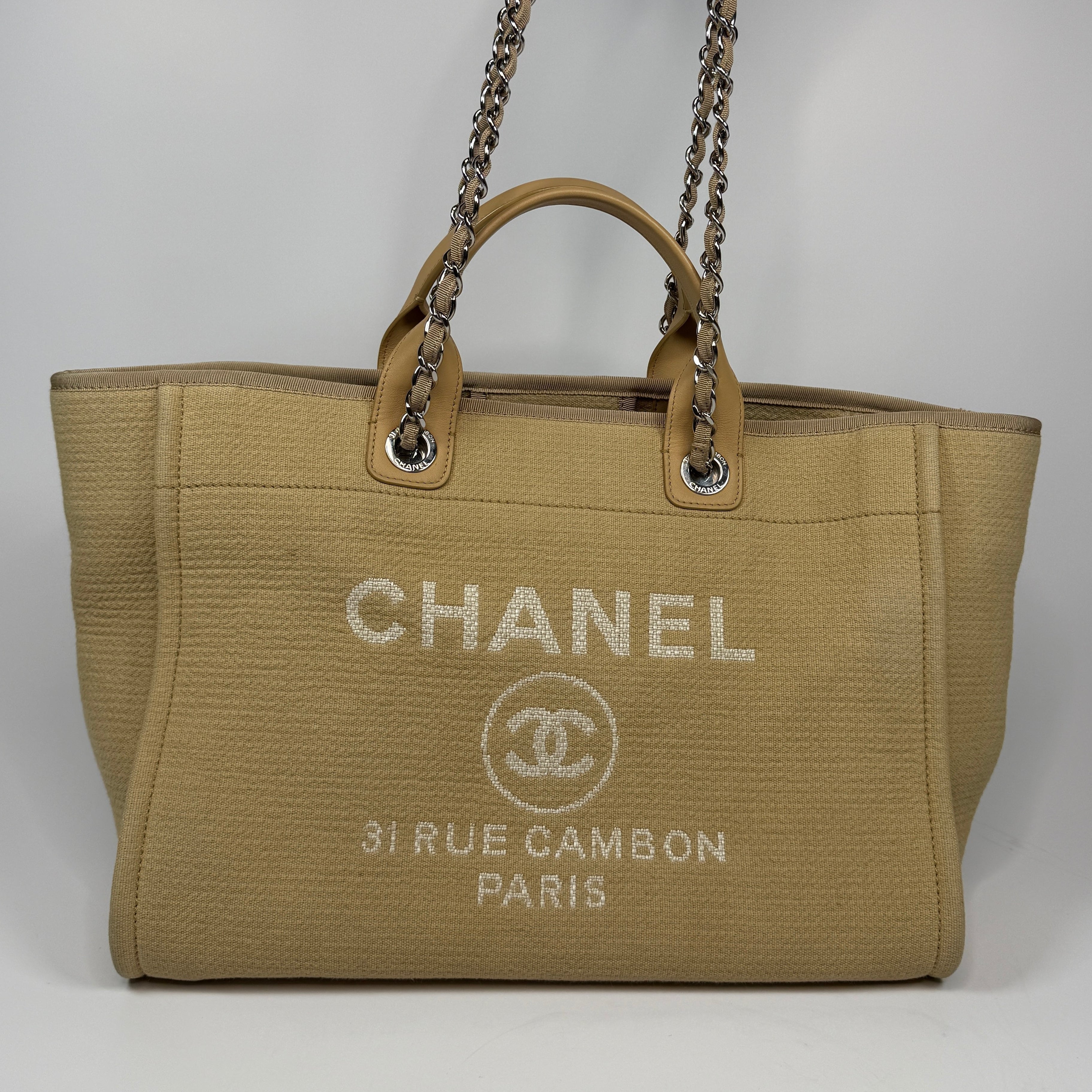 Chanel Large Deauville Tote Bag Large In Beige Fabric With Silver Hardware. Authentic and preloved In Very Good condition