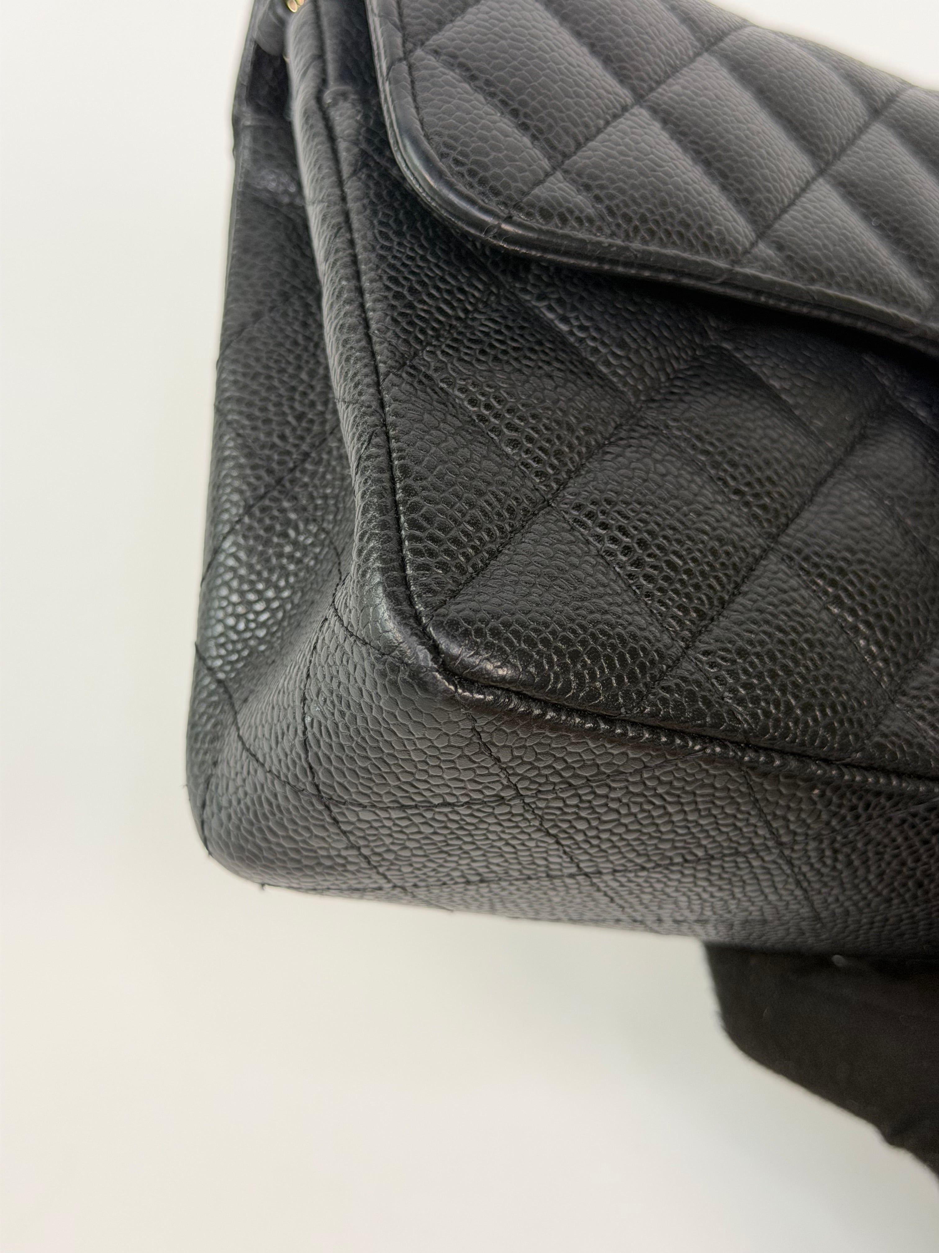 Chanel Small Classic Double Flap In Black Caviar Leather With Gold Hardware. 100% authentic and preloved in excellent condition