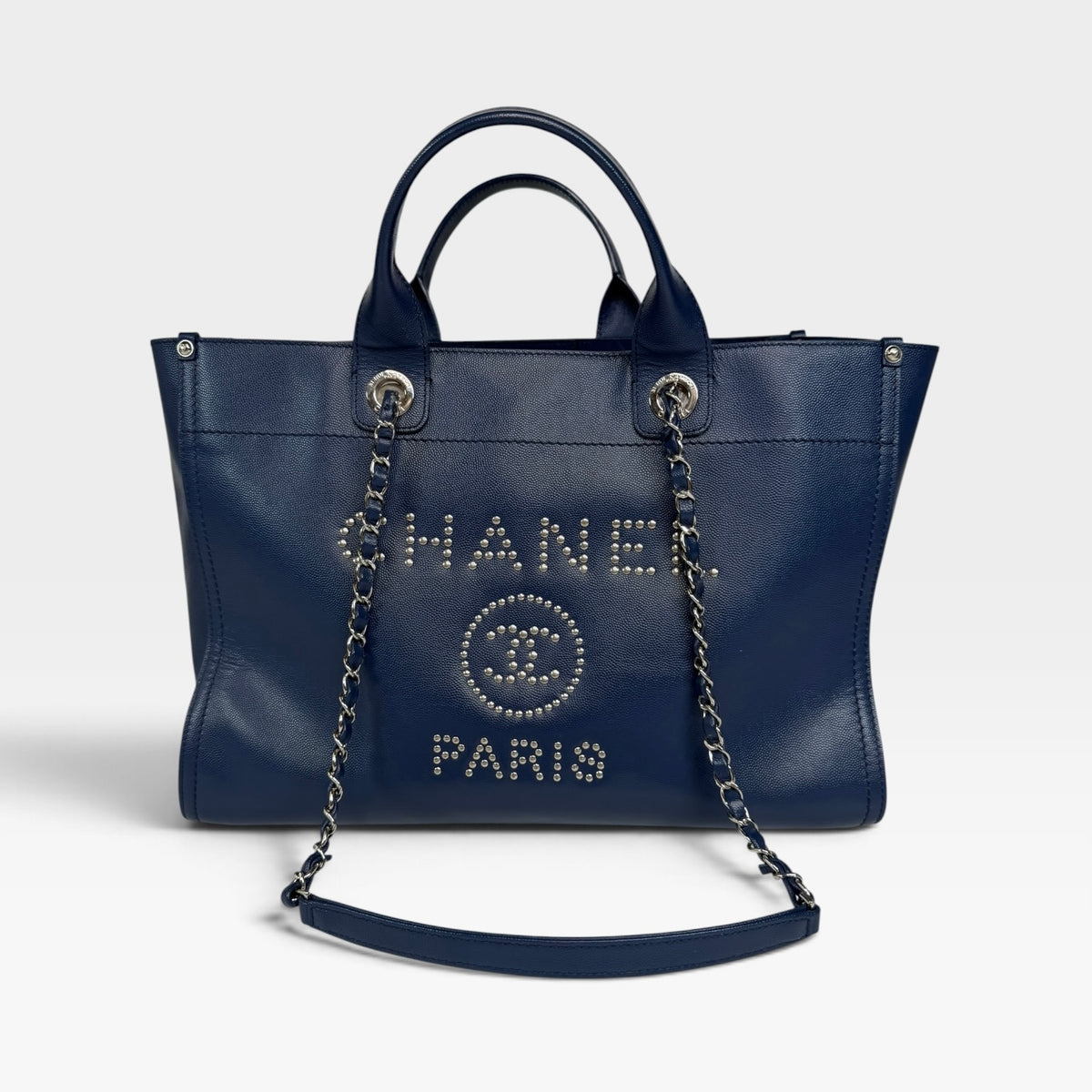Chanel Medium Deauville In Blue Leather With Silver Hardware. Authentic and preloved in very good condition. 100% Luxe guarantee 