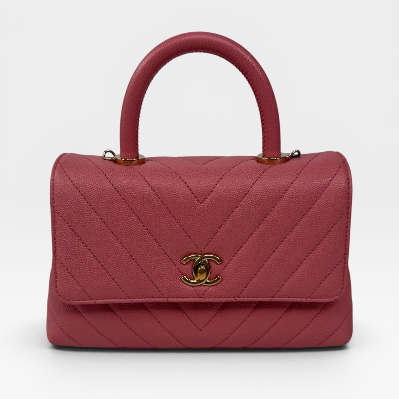 Chanel Small Chevron Coco Top Handle In Pink Caviar With Gold Hardware. 100% authentic and preloved in very good condition