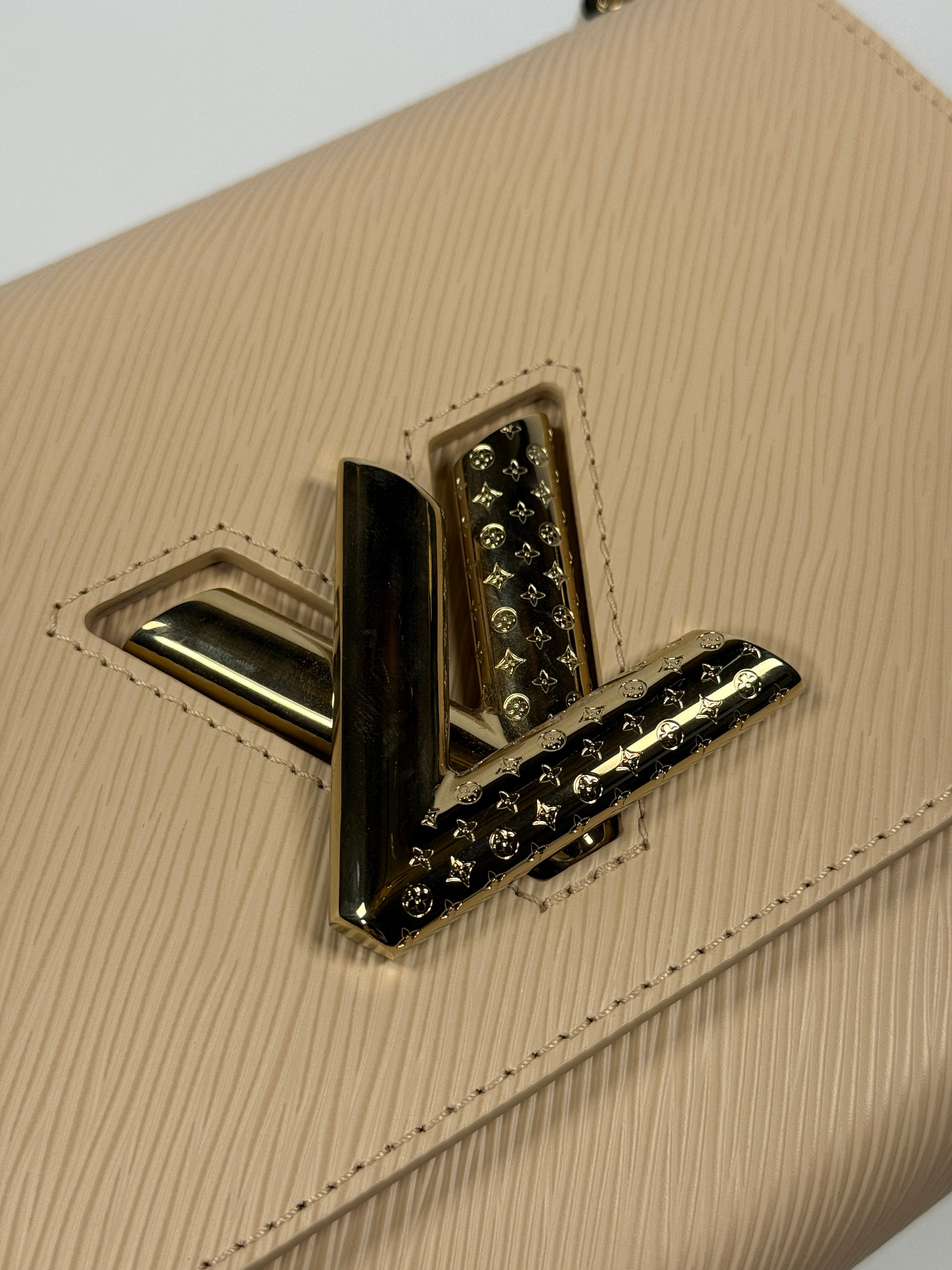 Louis Vuitton Twist MM Bag In Blush Pink Epi Leather