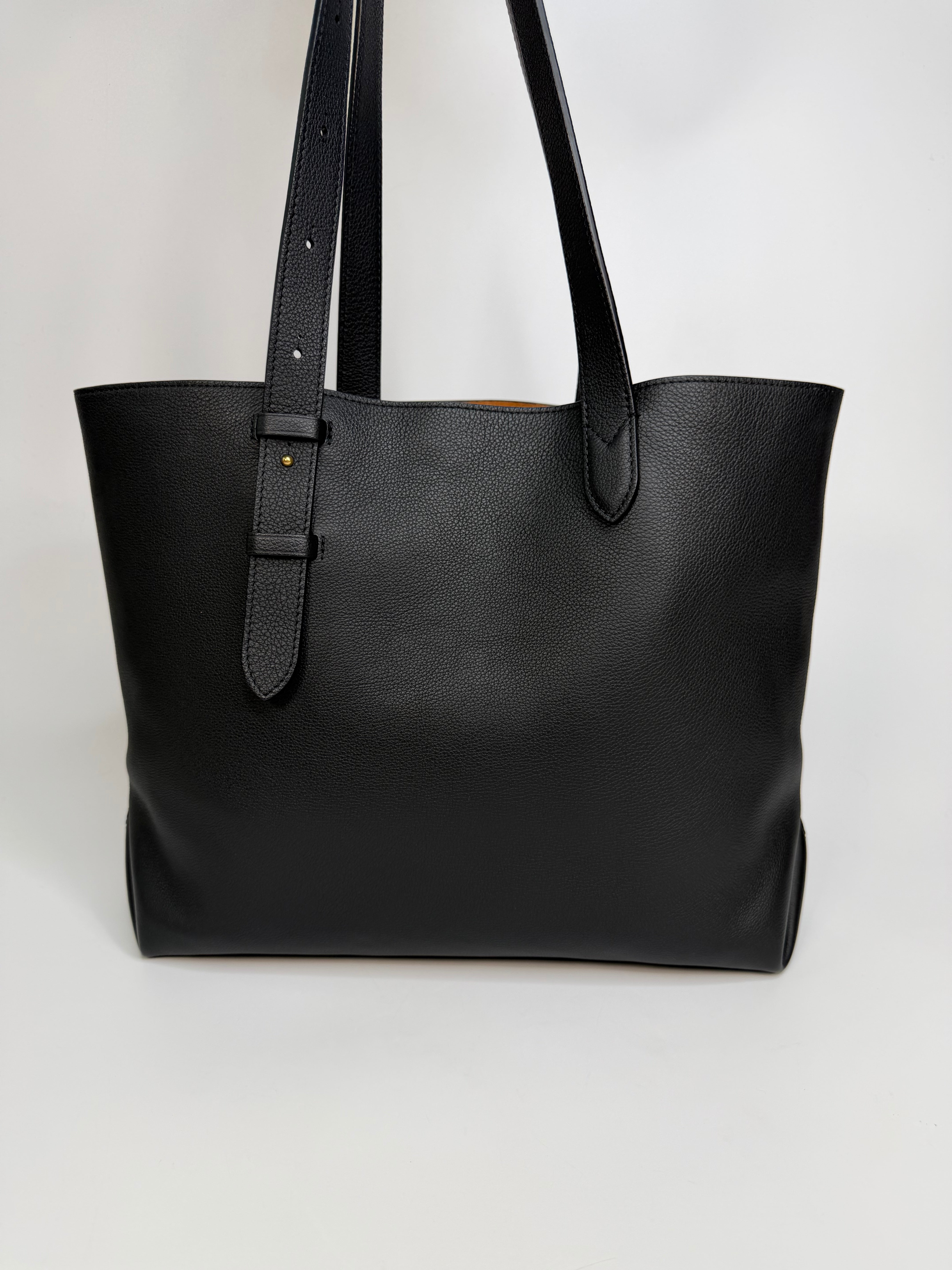 Louis Vuitton Low Key Cabas MM In Black Calfskin With Gold Hardware. Authentic and preloved in excellent condition
