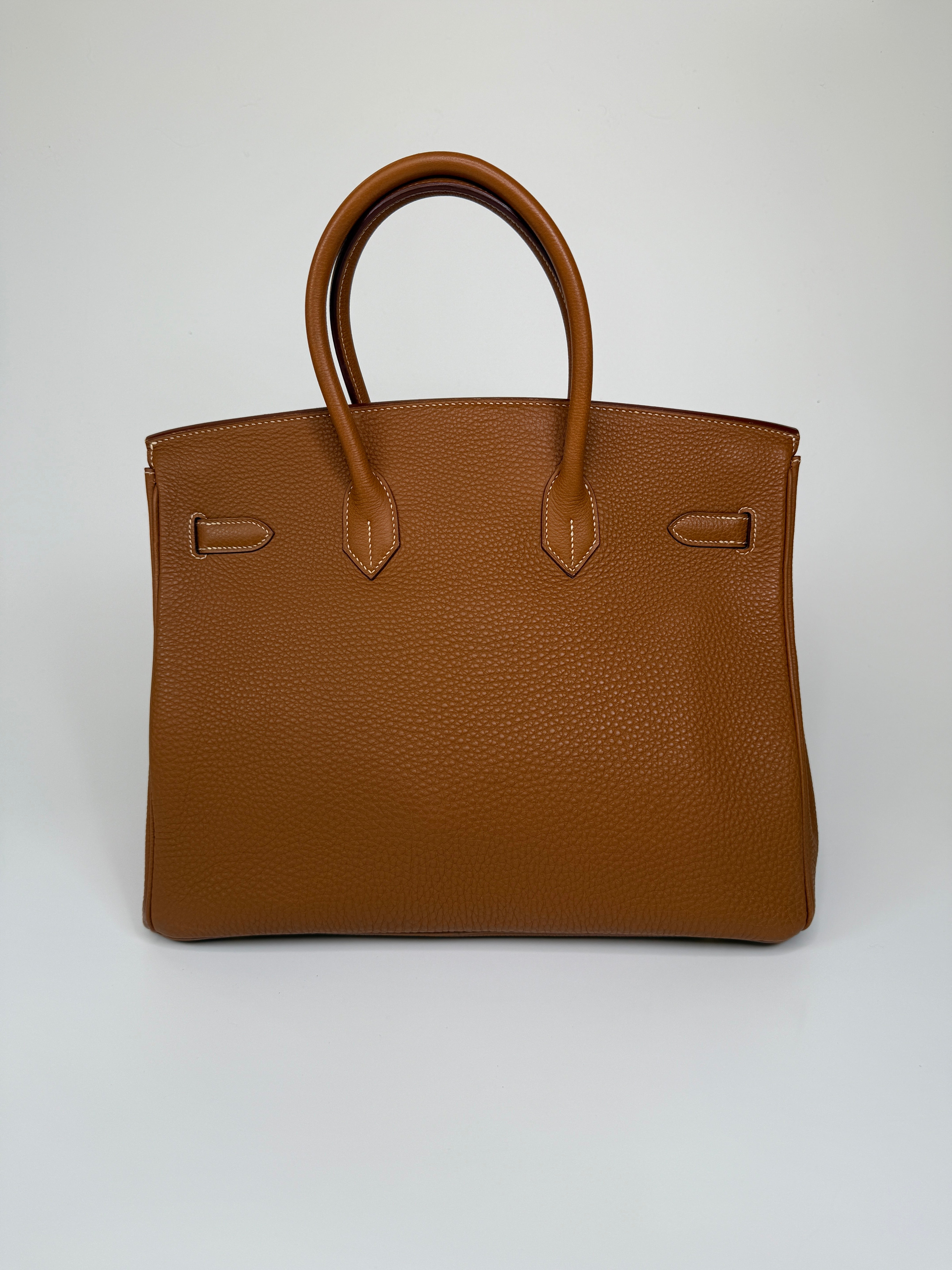 Authentic and preloved Hermès Birkin 35 In Gold Togo Leather With Gold Hardware. 100% Authenticity guarantee 