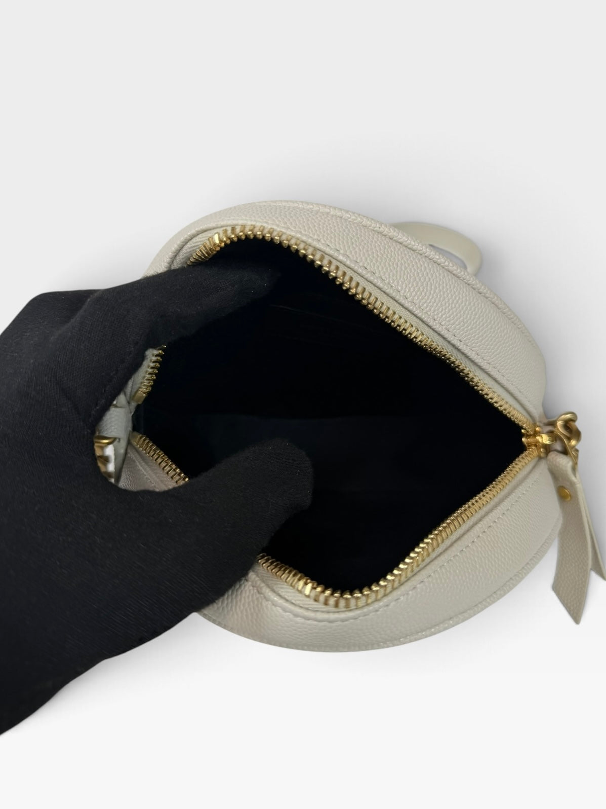 Saint Laurent Vinyle Round Bag In Stone Matelasse Chevron With Gold Hardware. 100% authentic and preloved in excellent condition