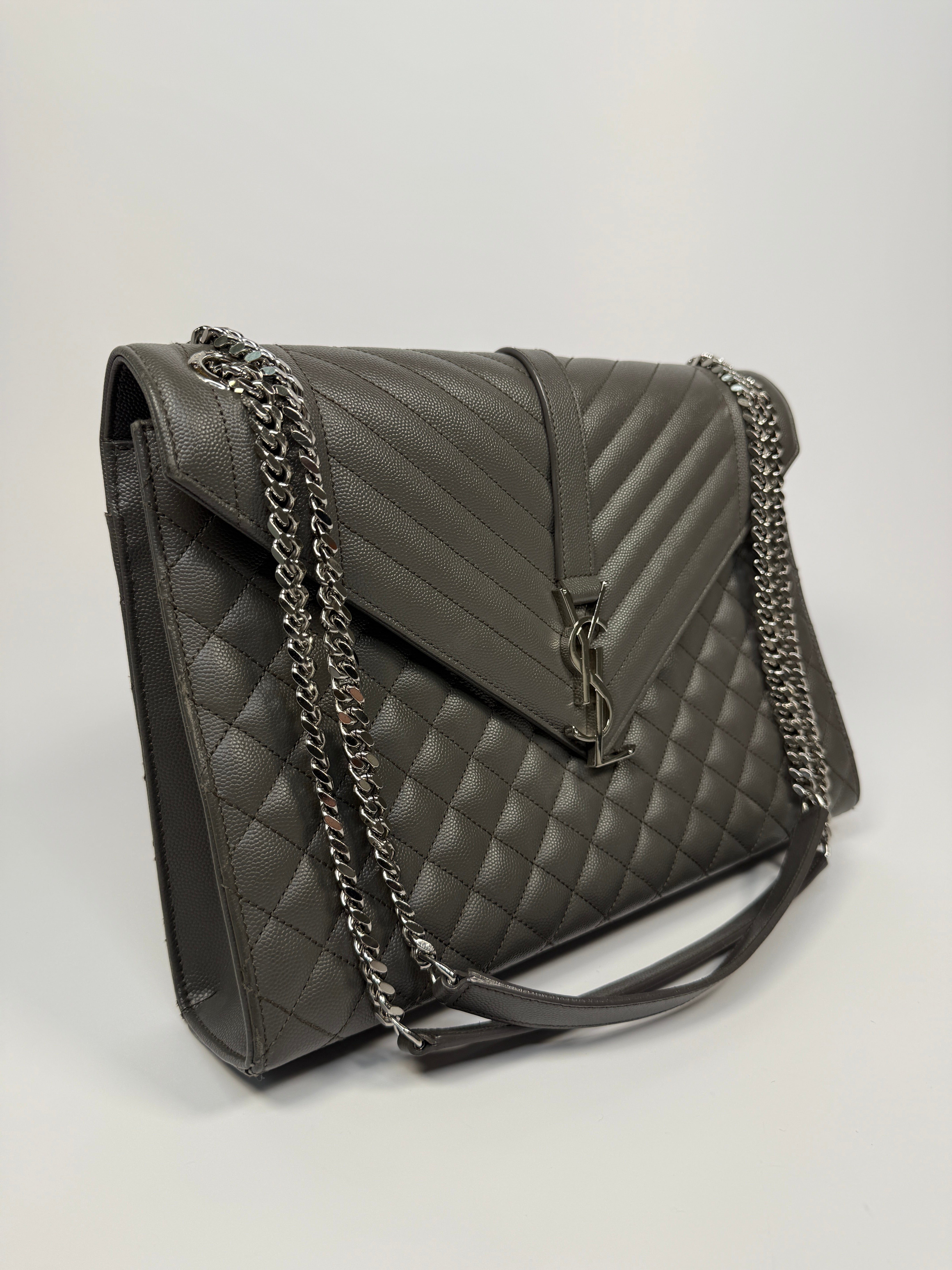 Saint Laurent Large Envelope Shoulder Bag In Grey Grained Leather With Silver Hardware. Excellent condition. Authentic and preloved. 