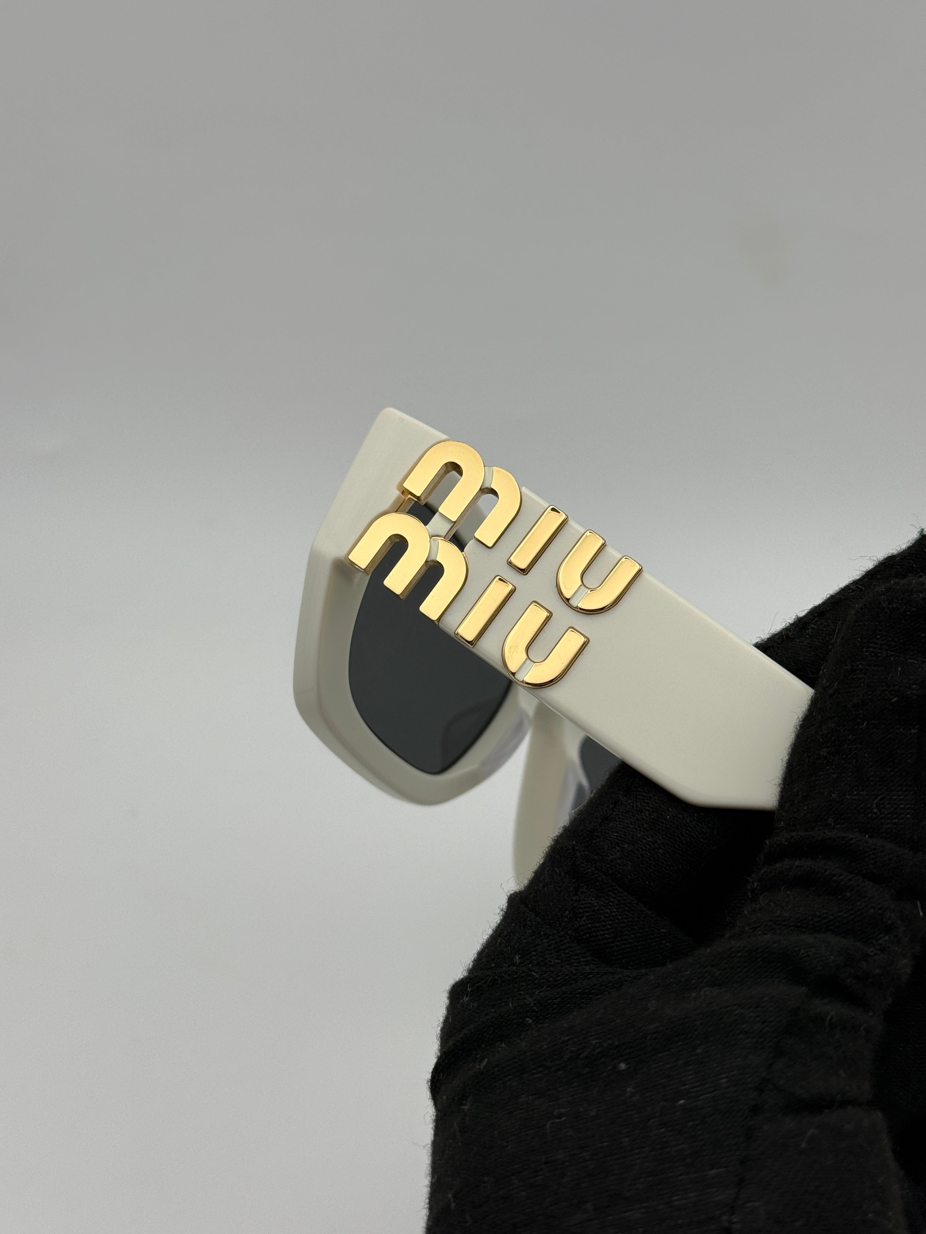 MiuMiu White logo sunglasses, Authentic and preloved. 100% Authenticity guarantee 