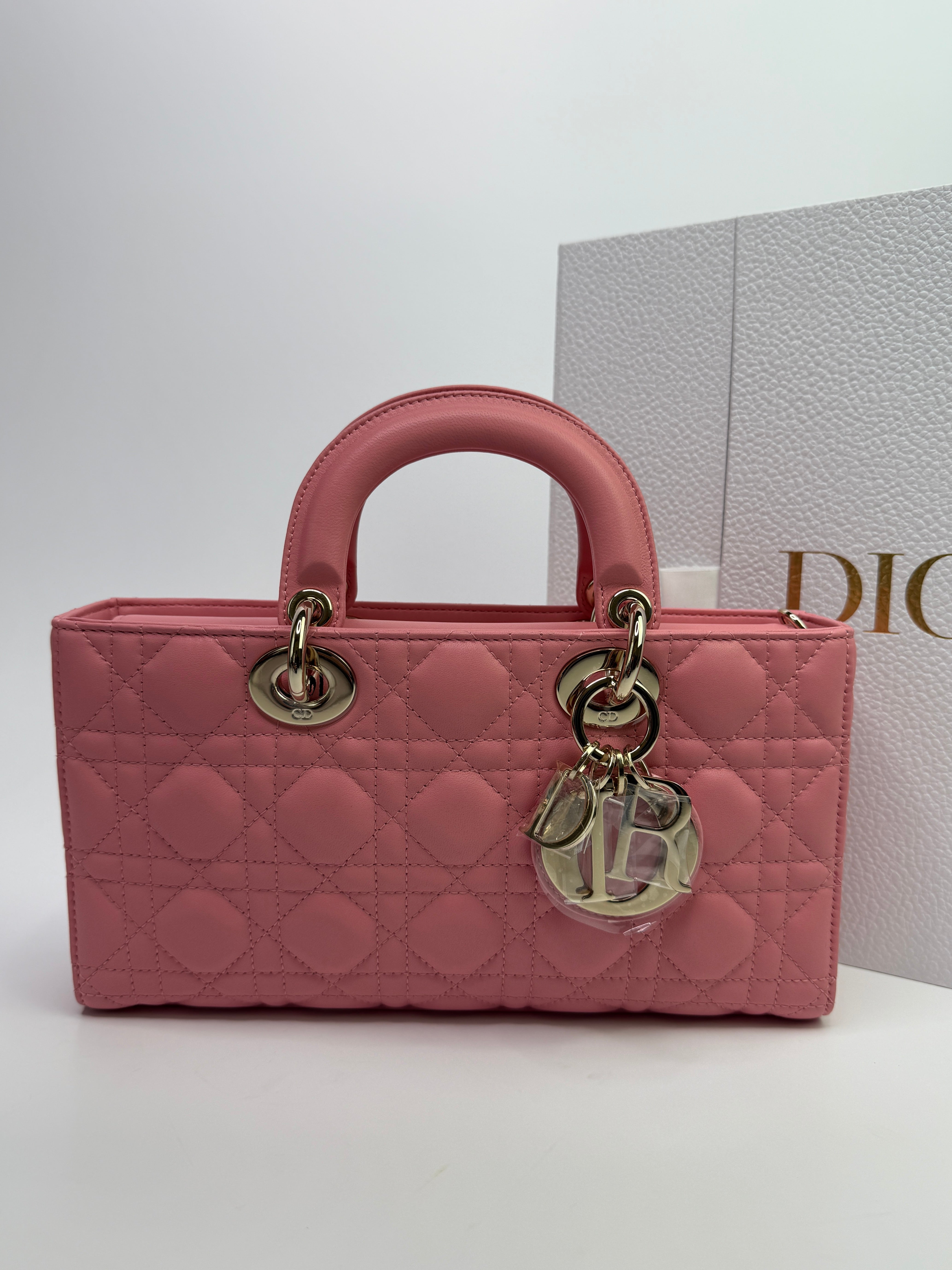 Authentic pre-loved Christian Dior Medium D-Joy bag. New & Unused.