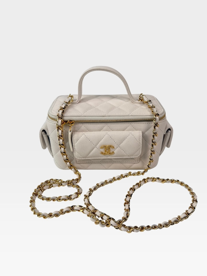 Chanel Vanity Top Handle  Multi Pockets In White Caviar Leather With Gold Hardware. 100% authentic and preloved in excellent condition