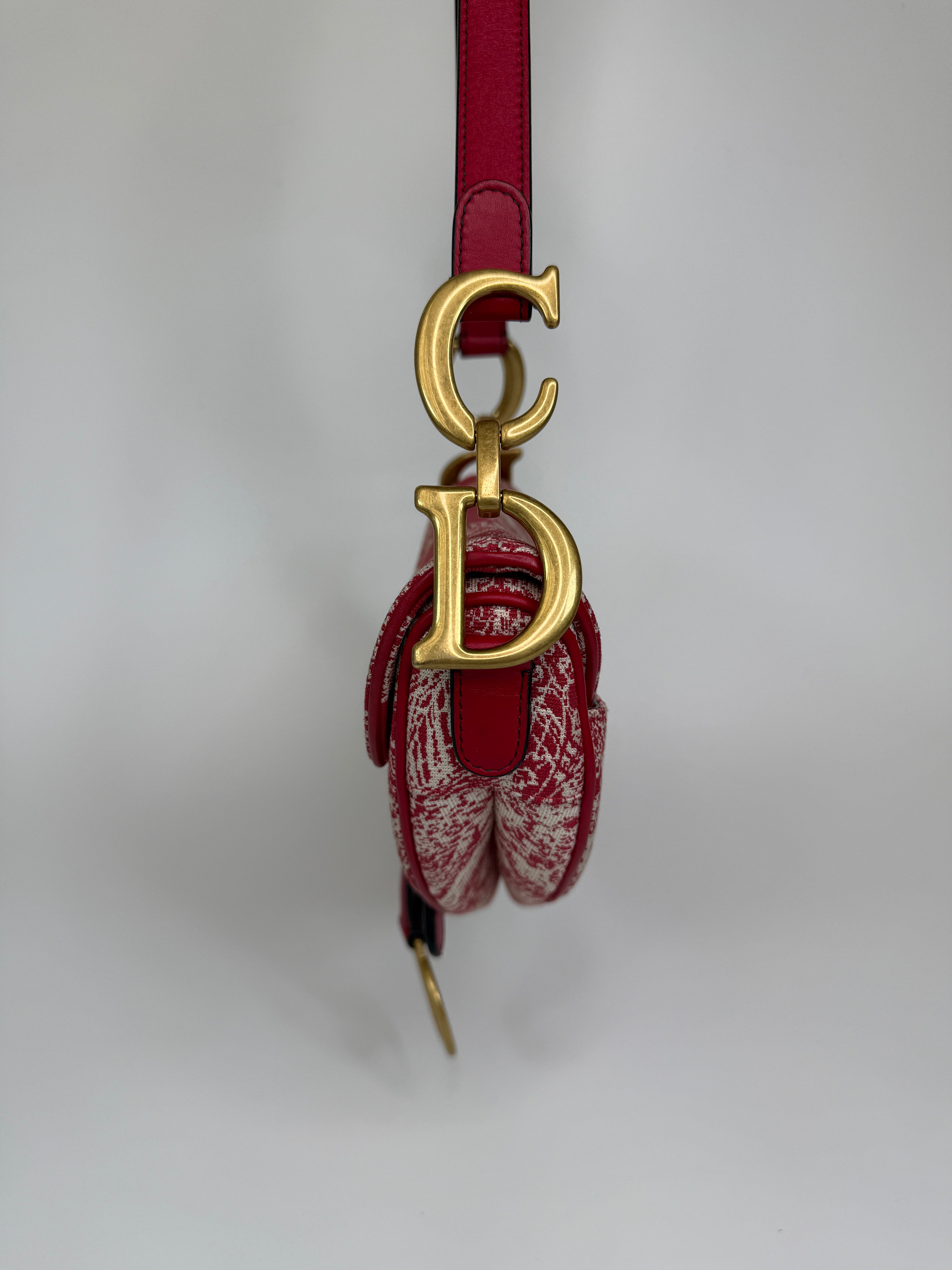 Christian Dior Saddle Bag In Rain Forest Red. Authentic and preloved In excellent condition. 100% Authenticity guarantee 