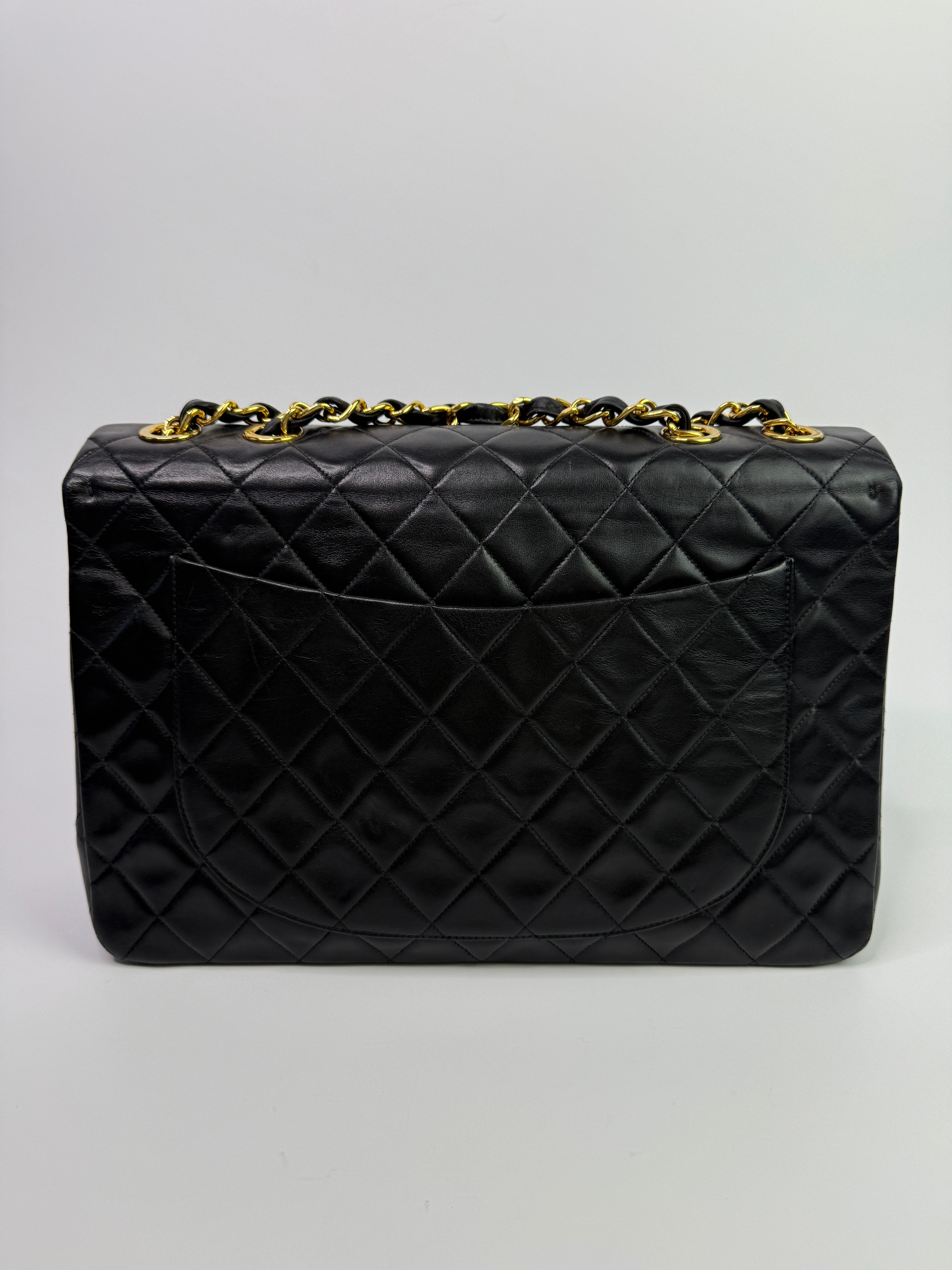 Chanel Vintage XL Maxi Flap Bag In Black Lambskin