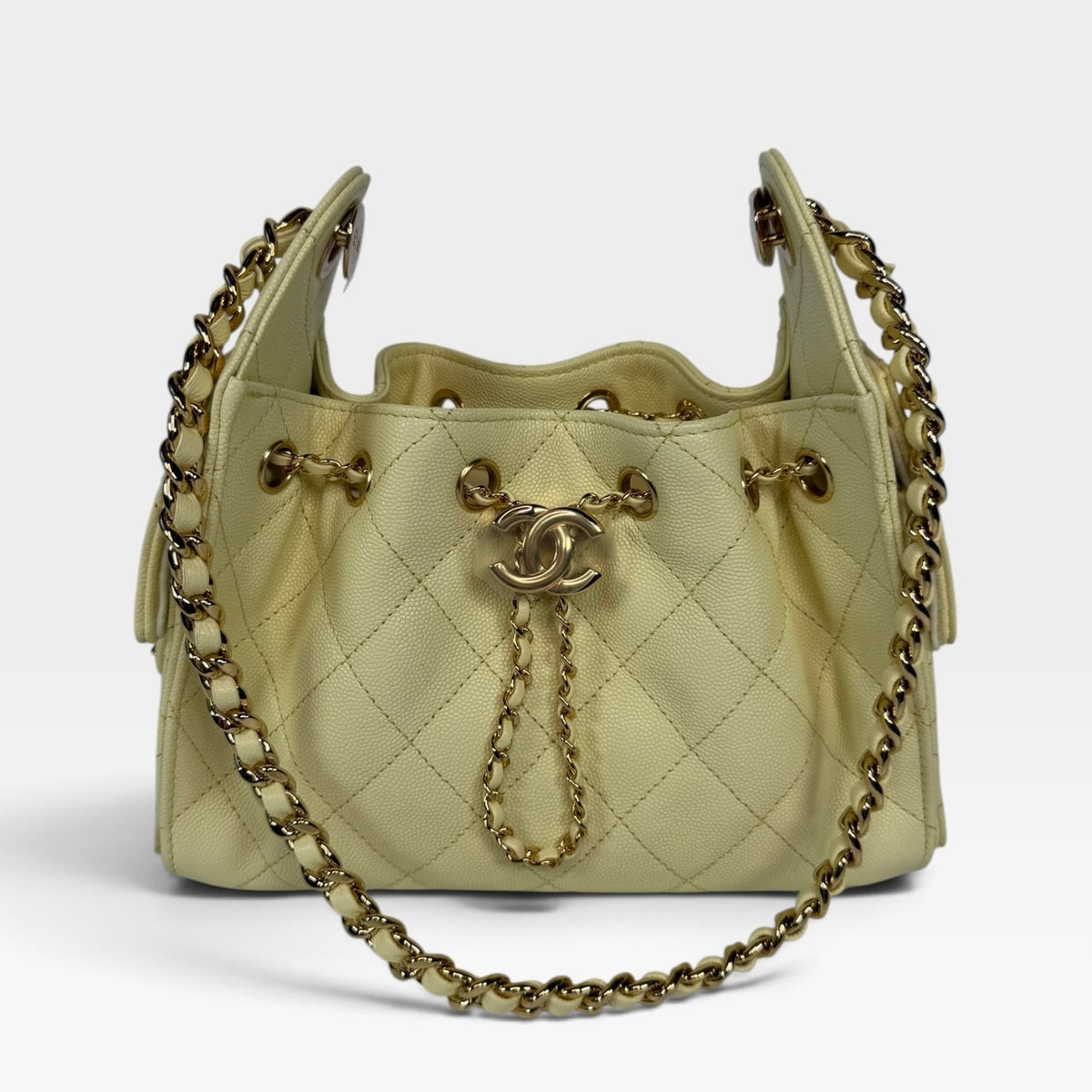 Chanel 25 Micro In Yellow Caviar Leather with Gold Hardware. 100% authentic and preloved in new and unused condition