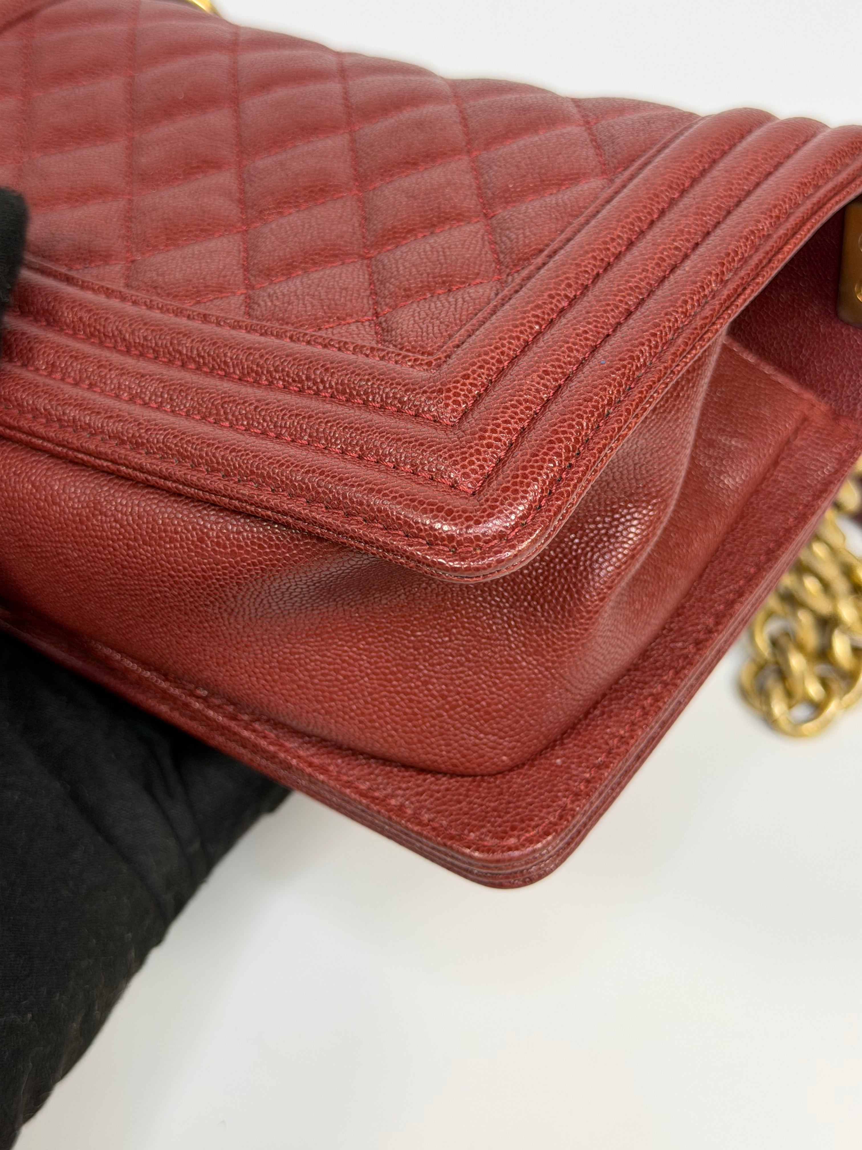 Chanel Le Boy Bag In Burgundy Caviar Leather Gold Hardware. Authentic and preloved in excellent condition.