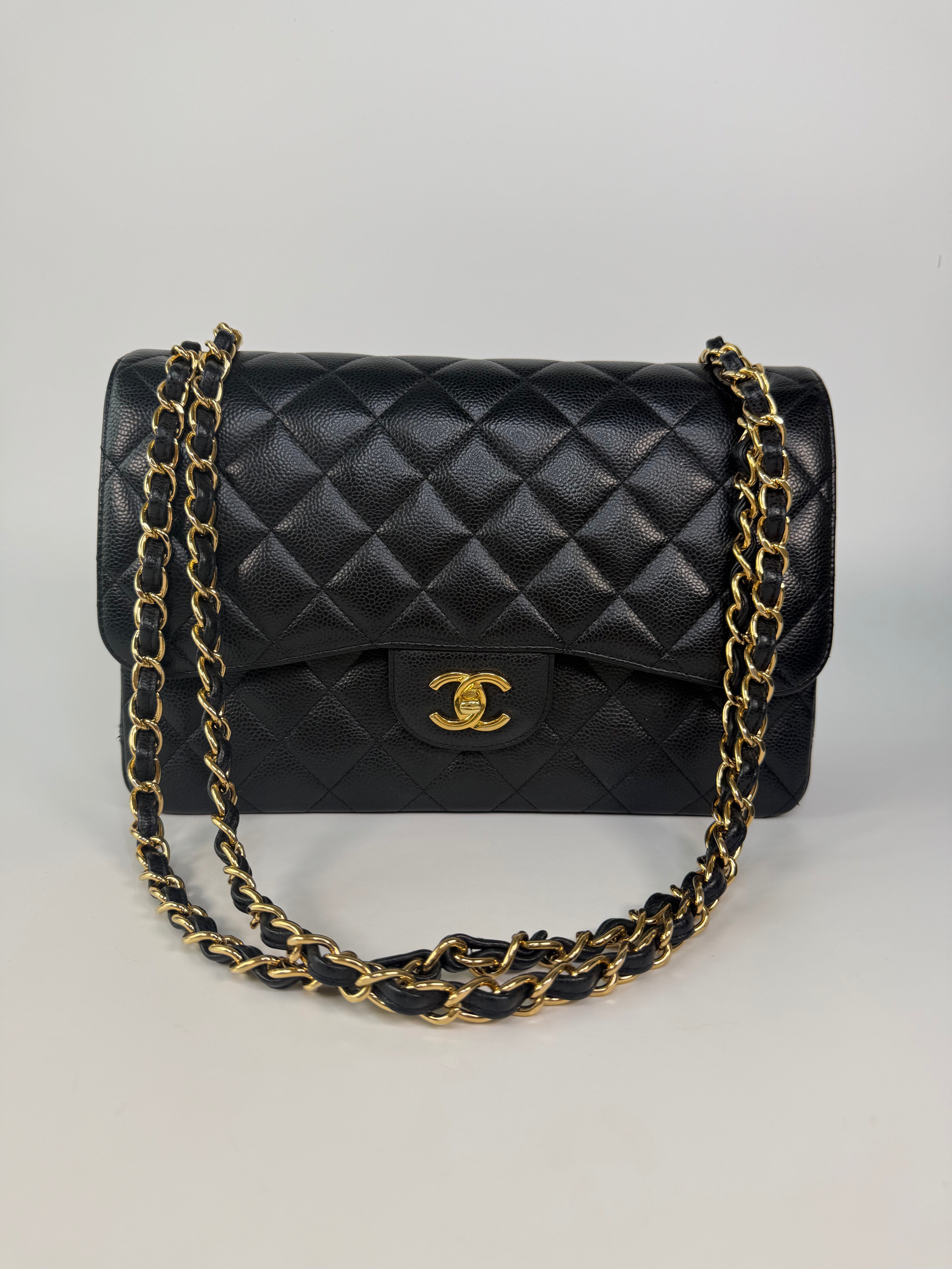 Chanel Jumbo Classic Flap Bag In Black Caviar Leather With Gold Hardware 100% authentic and preloved in excellent condition