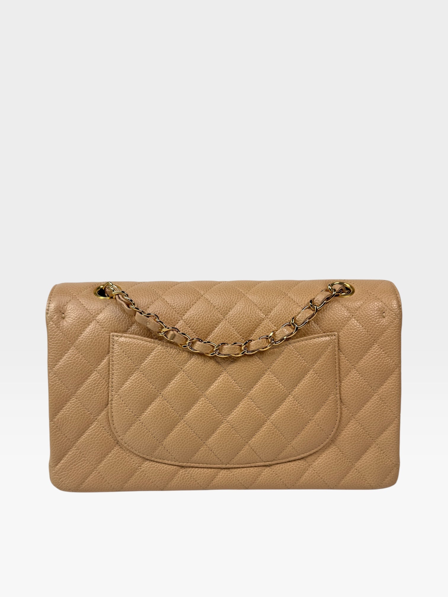 Chanel Medium Classic Flap In Beige Caviar Leather With Gold Hardware. 100% authentic and preloved in excellent condition