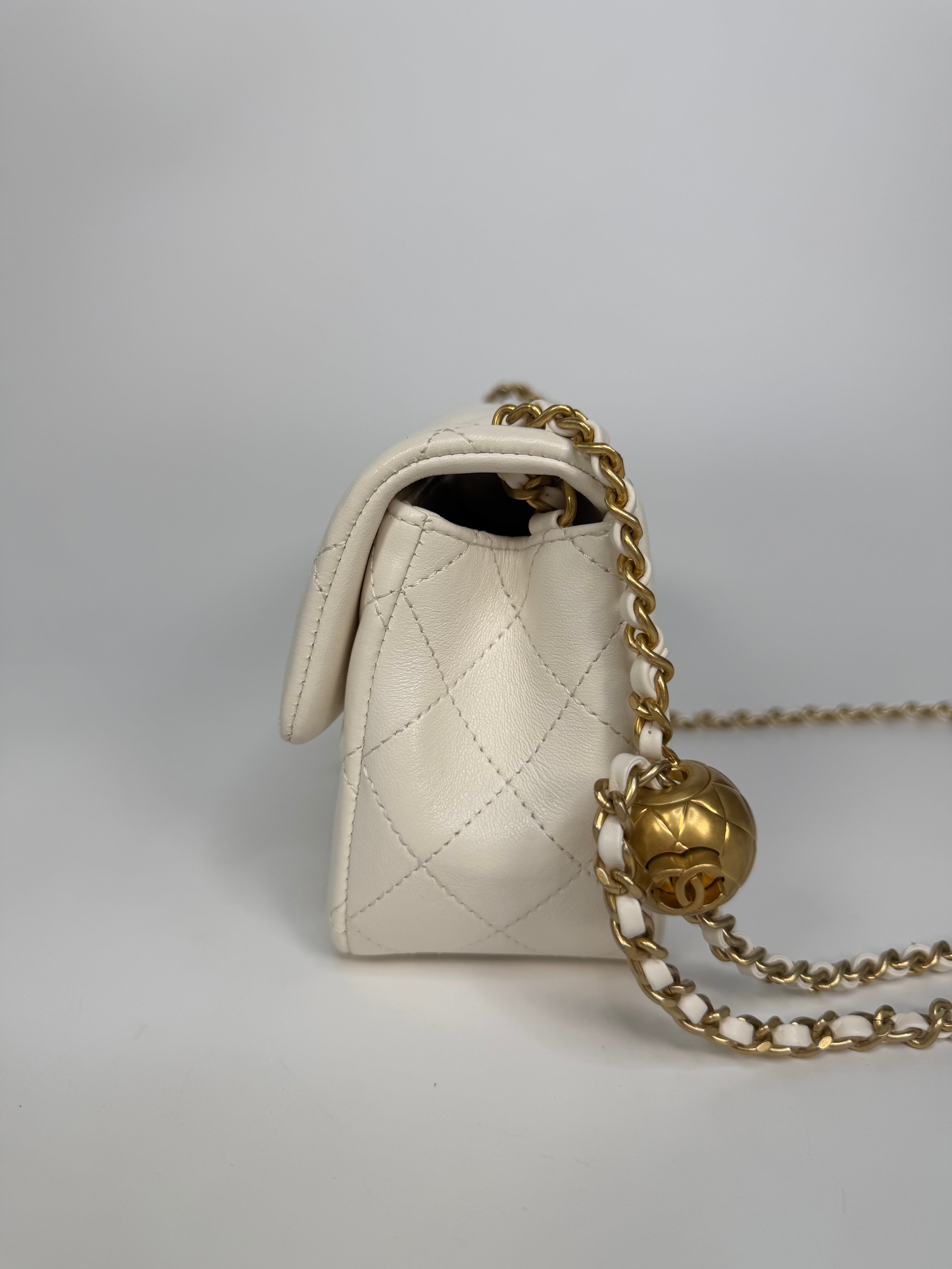 Chanel Pearl Crush Mini Rectangle In White Lambskin Leather Gold Hardware. Authentic and preloved in excellent condition with 100% authenticity guarantee.
