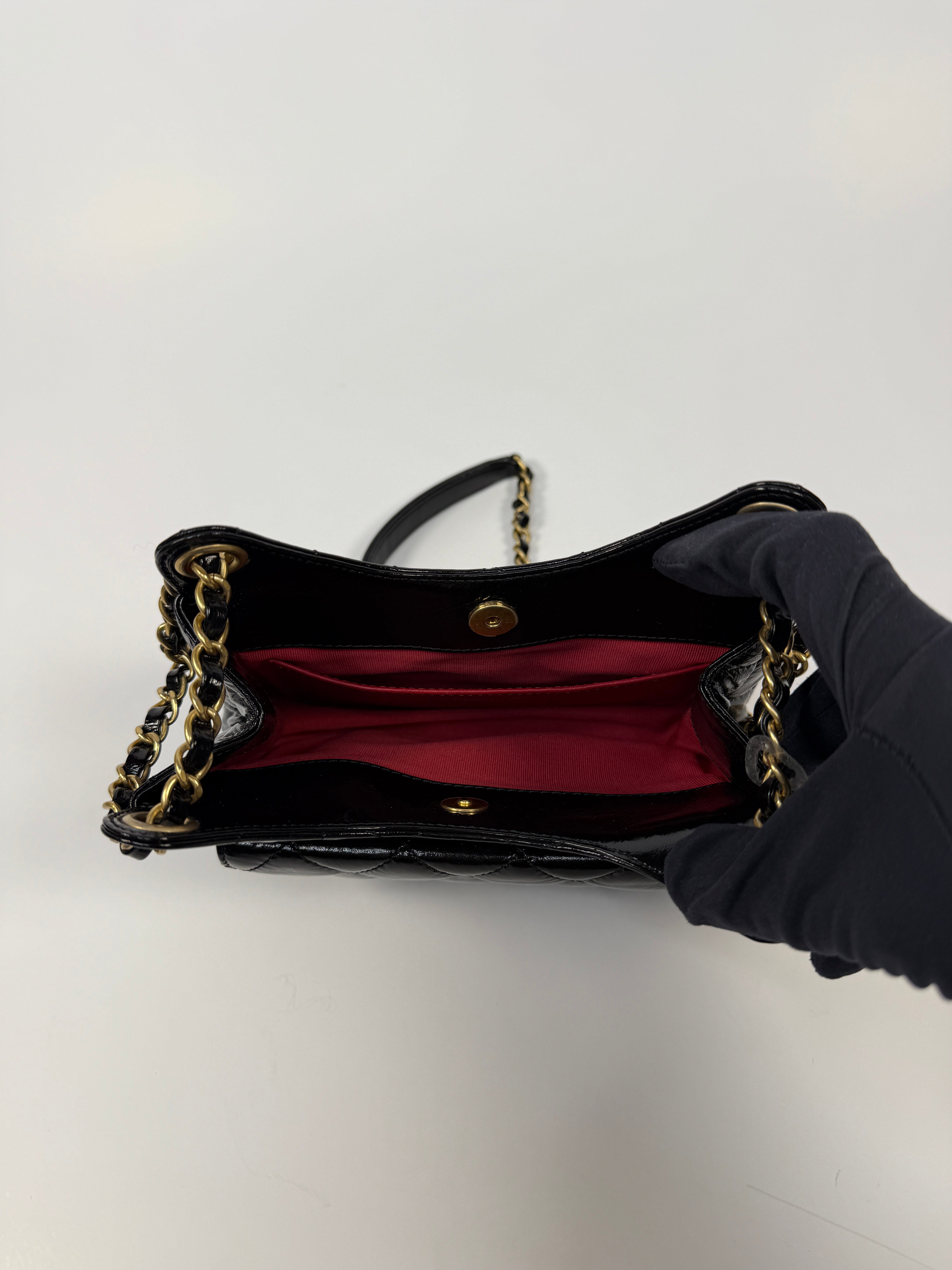 Chanel Mini Quilted Medallion Shoulder Bag In Black Calfskin With Gold Hardware. Authentic and preloved. Excellent condition. 
