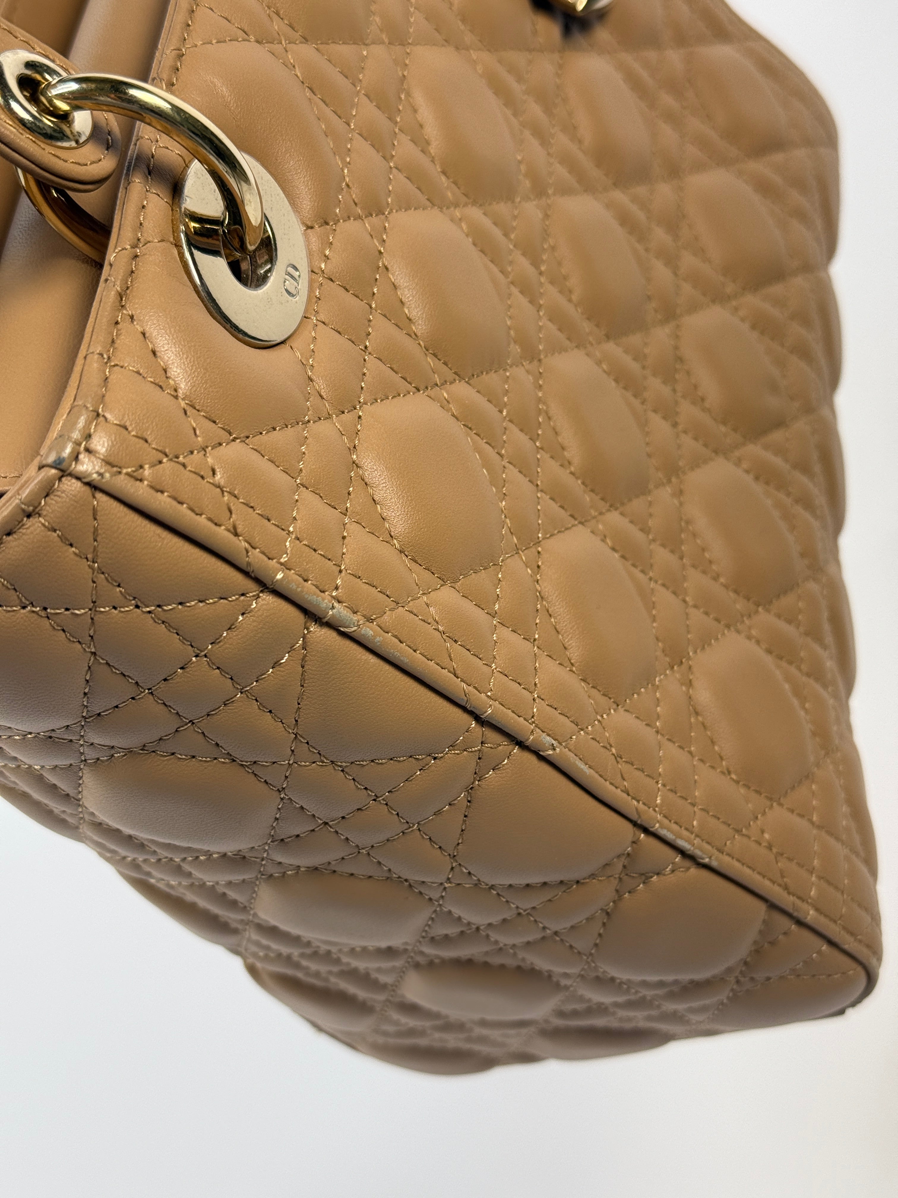 Authentic pre-loved Christian Dior Medium Lady Dior Bag in gold with gold hardware