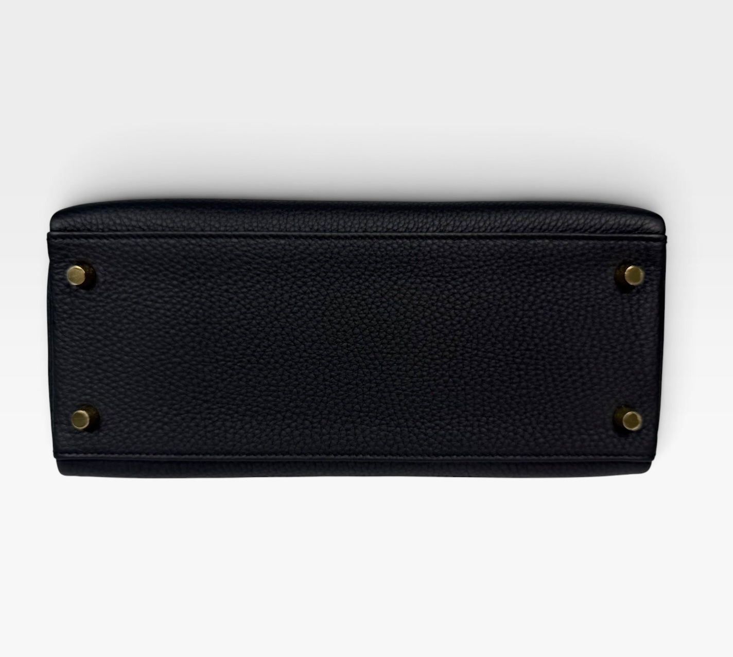 Authentic pre-loved Hermès Kelly 28 In Black Togo Leather Gold Hardware. New and Unused condition, verified by Luxe Cheshire. Trusted designer resale.