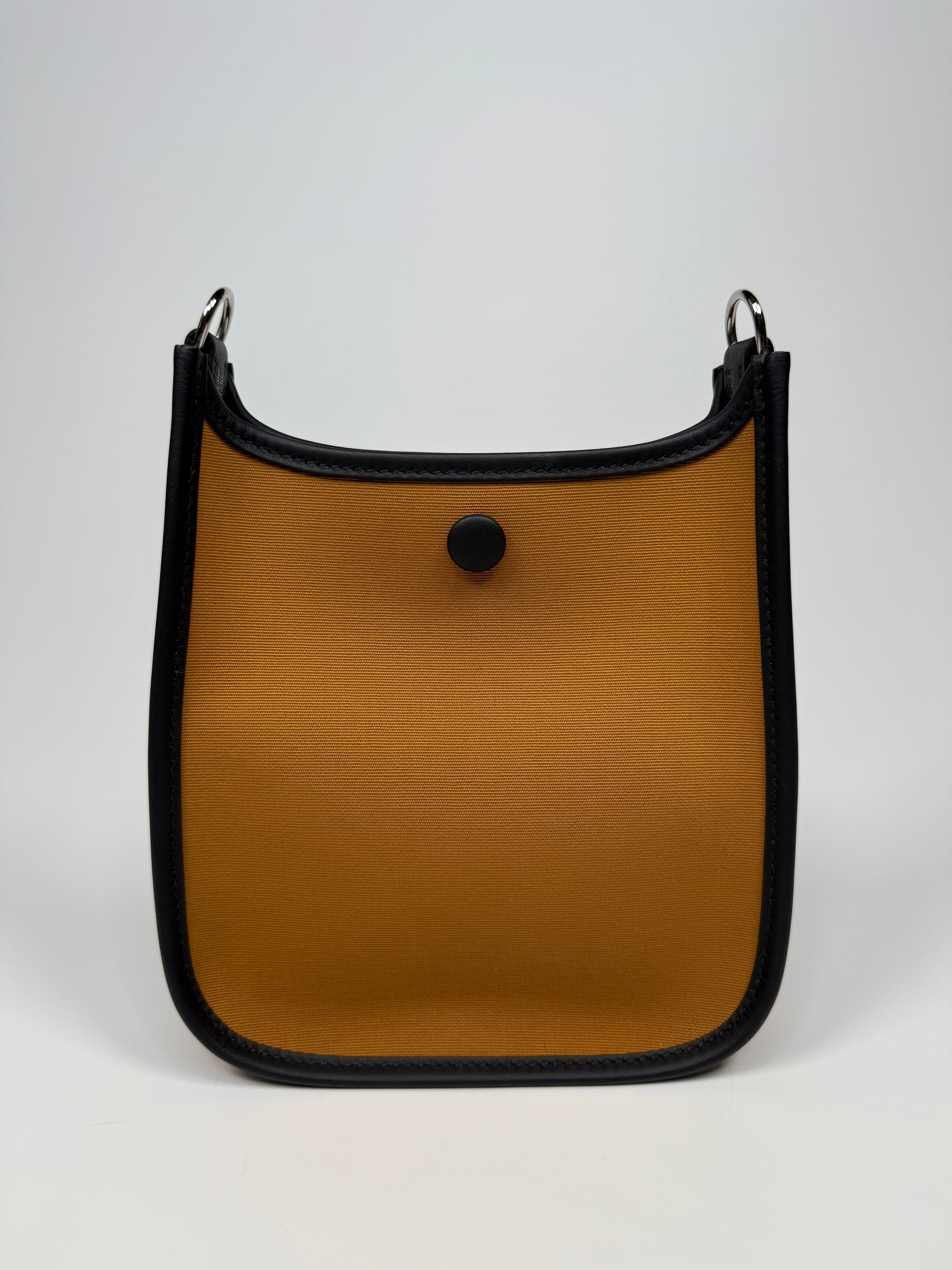 Hermès Evelyne TPM In Dune Cassis & Caban With Palladium hardware. Authentic and preloved. New condition.