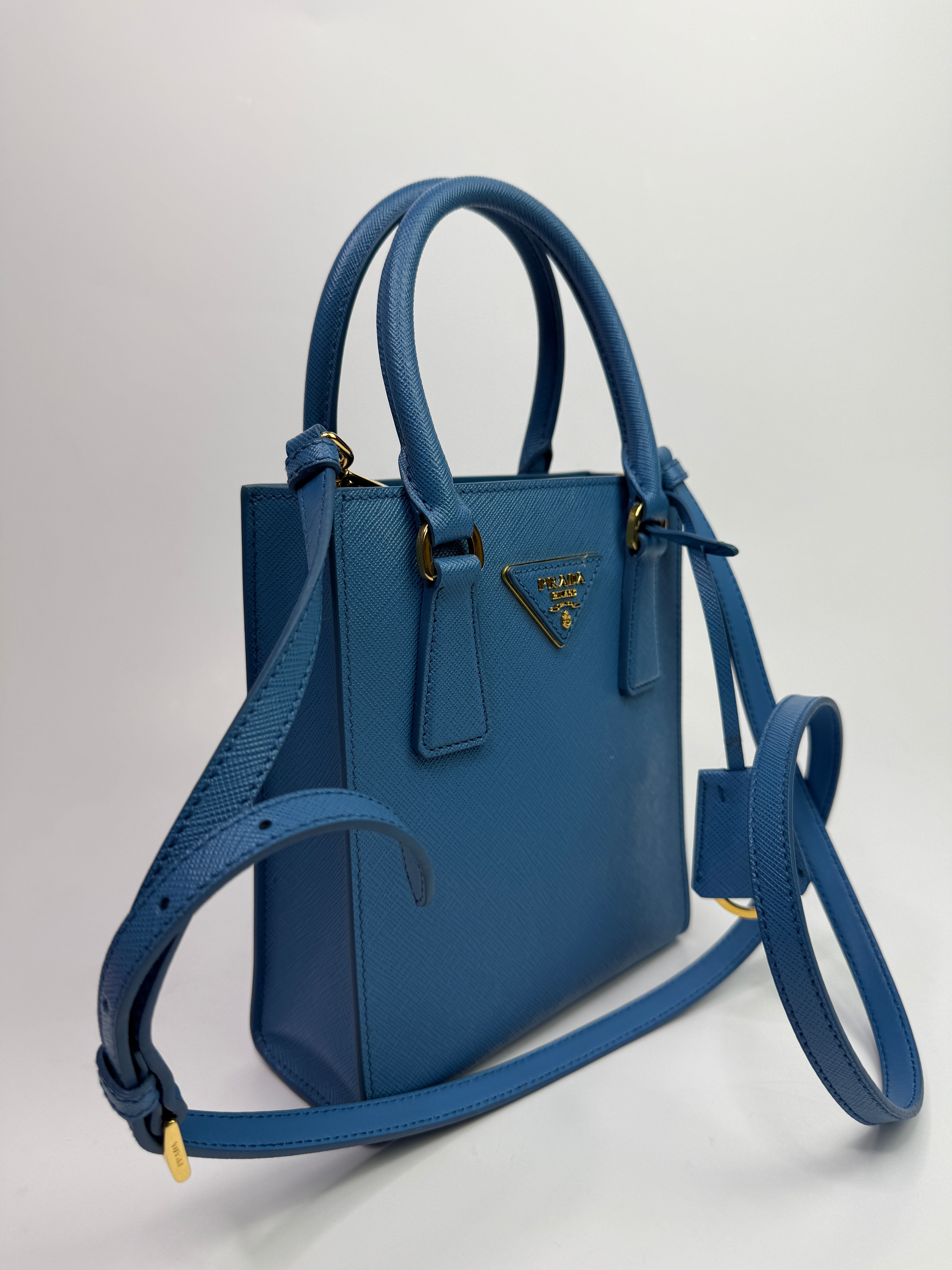 Prada Mini Tote In Powder Blue Saffiano Leather
Authentic Pre Loved Verified by Luxe Cheshire Trusted Designer resale