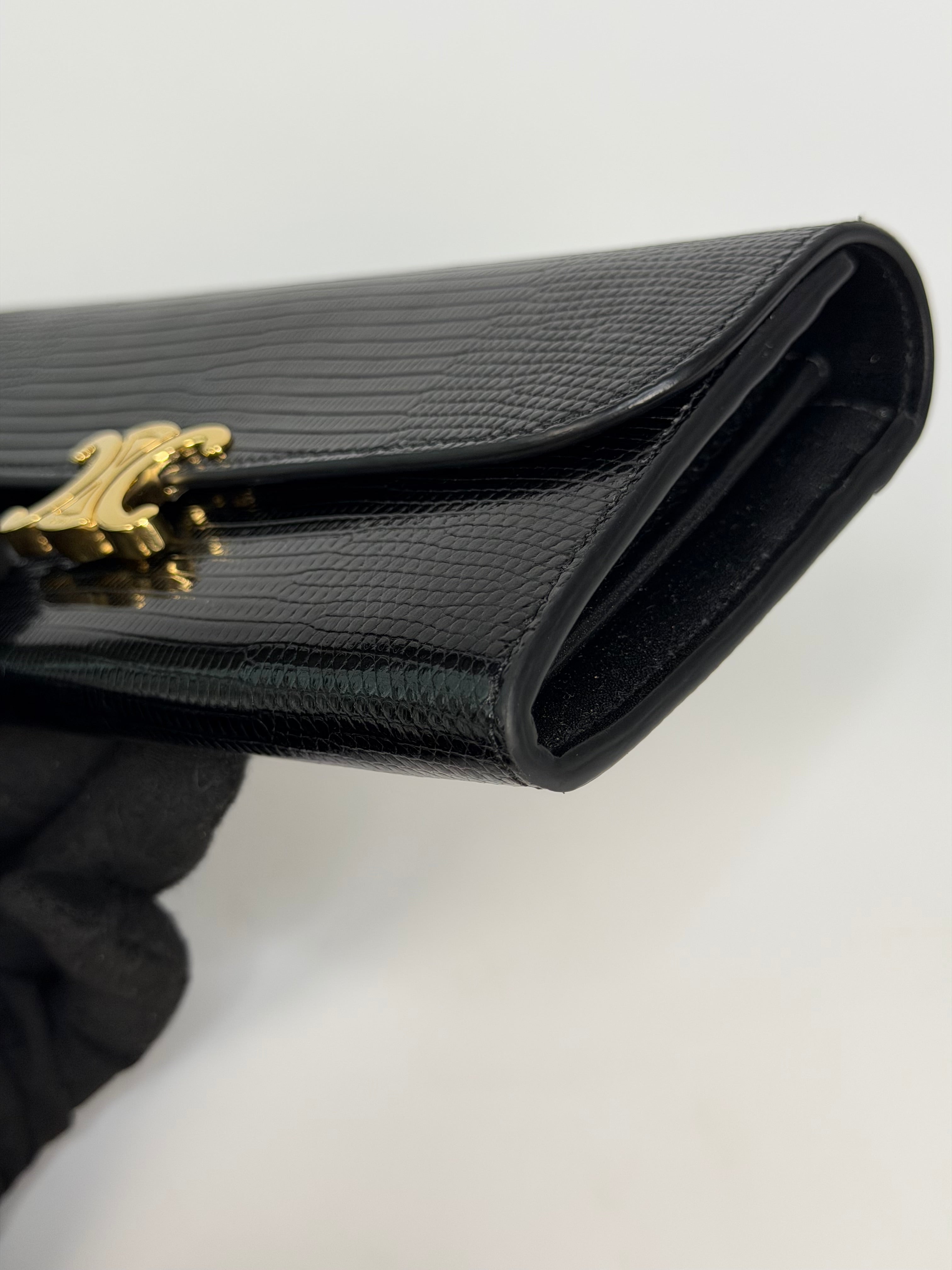 Celine Triomphe Wallet In Black Lizard Embossed Calfskin Gold Hardware. Authentic and preloved in excellent condition