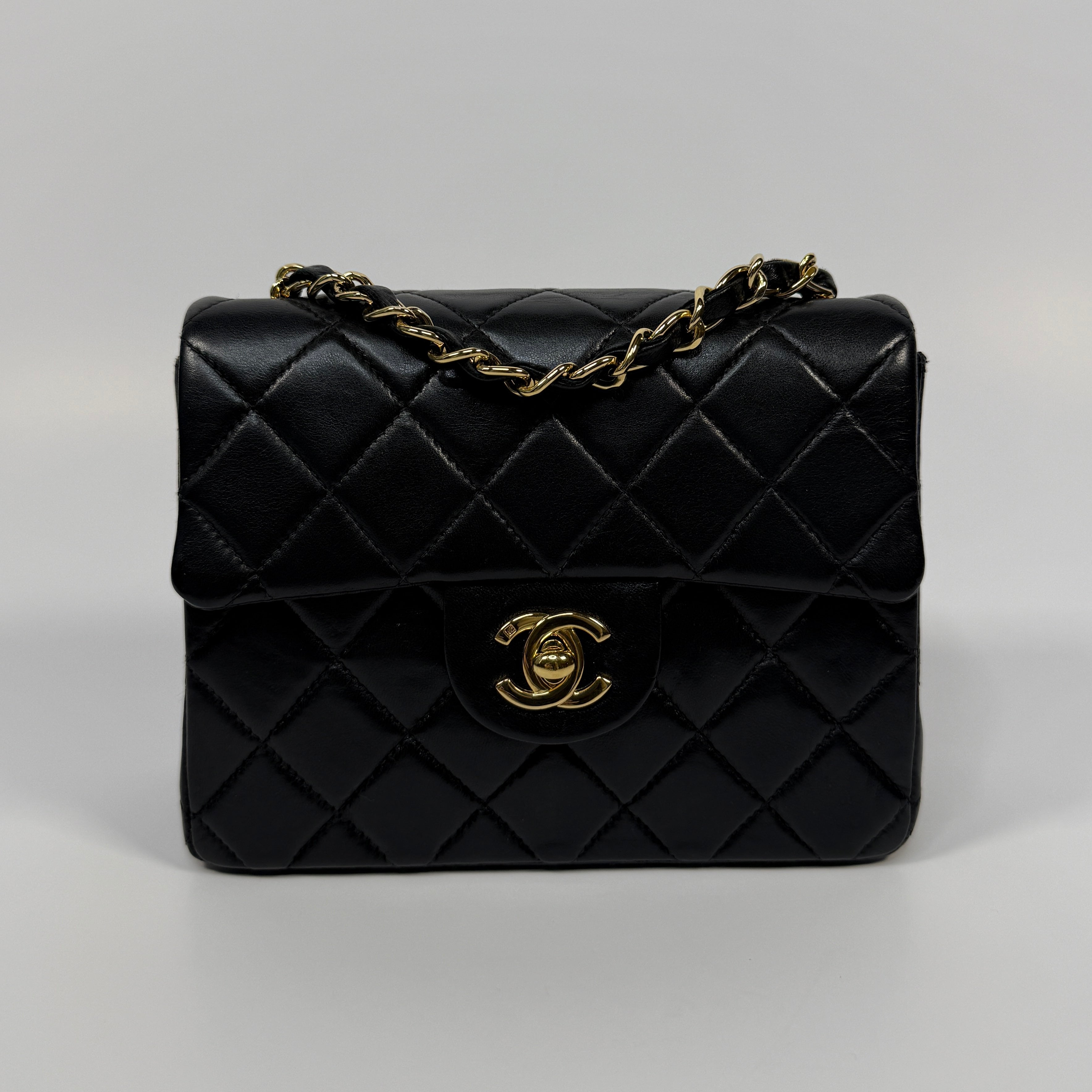 Chanel Black Square Vintage Flap Bag In Lambskin With Gold Hardware
Pre Loved & Authentic 